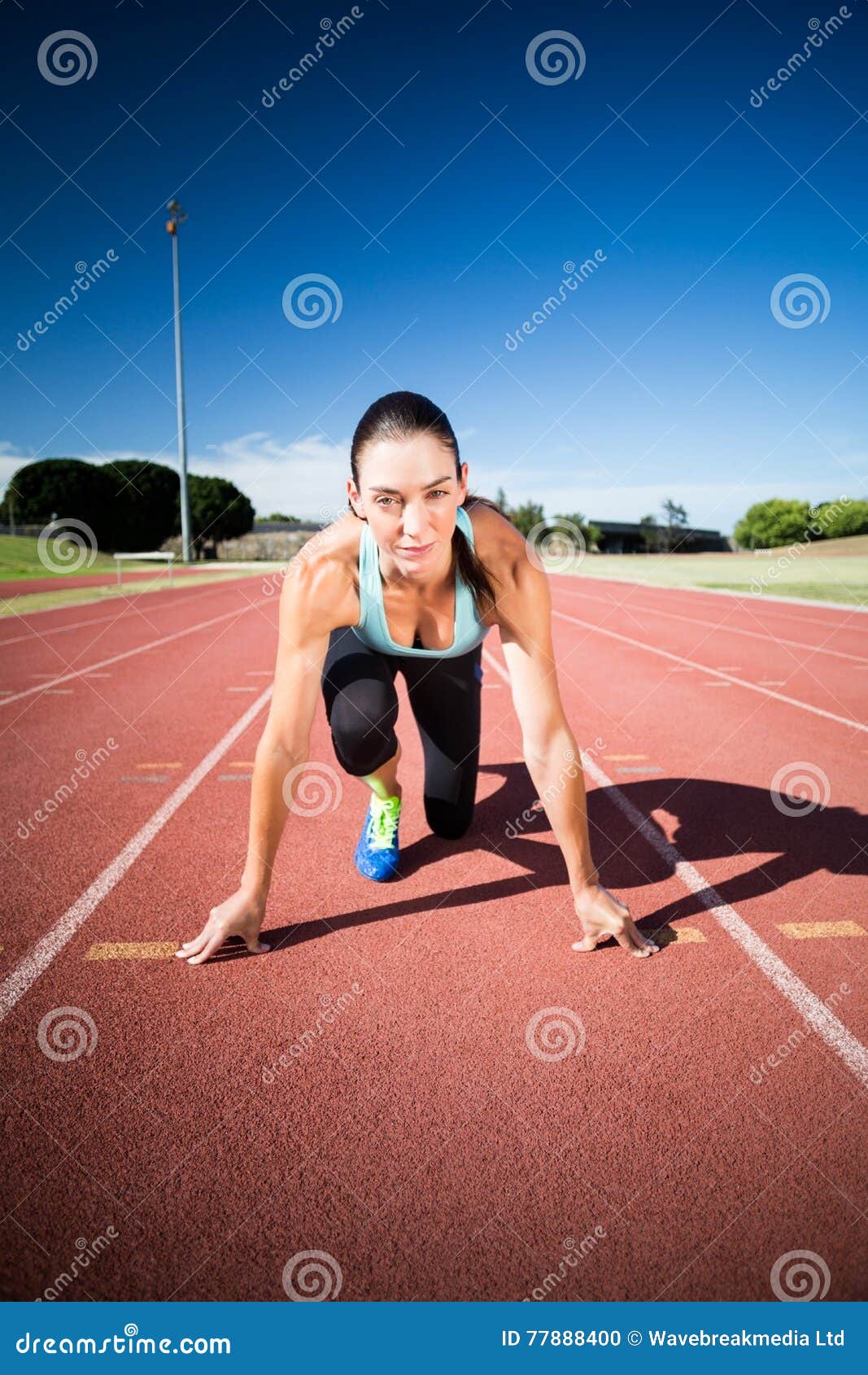 Action Packed Close-Up Image Of A Female Athlete Leaving 