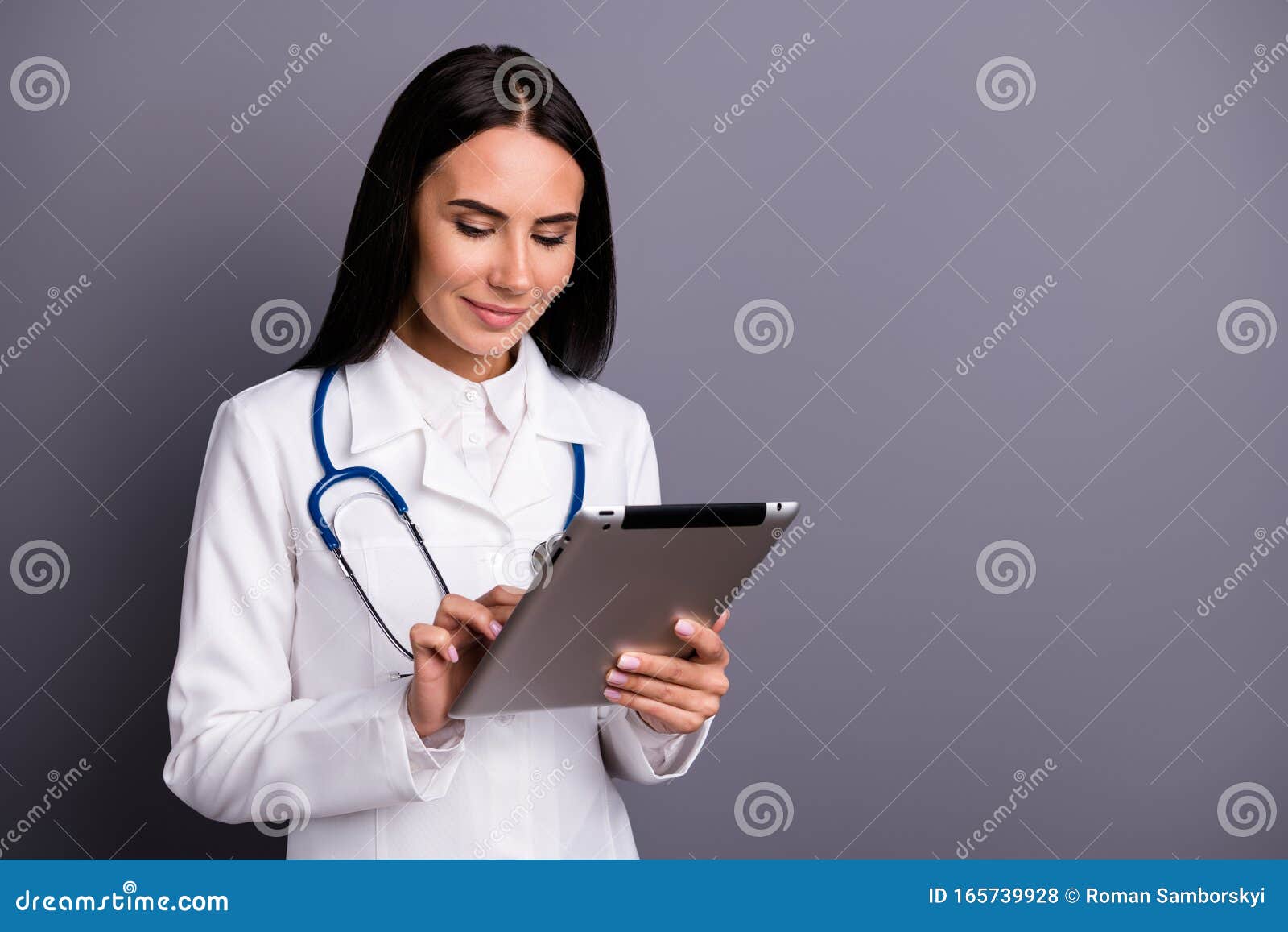 Portrait of Focused Brown Hair Doctor Girl Consult Patient Use Tablet  Search Read Cardiology Information Wear White Coat Stock Photo - Image of  doctor, girl: 165739928