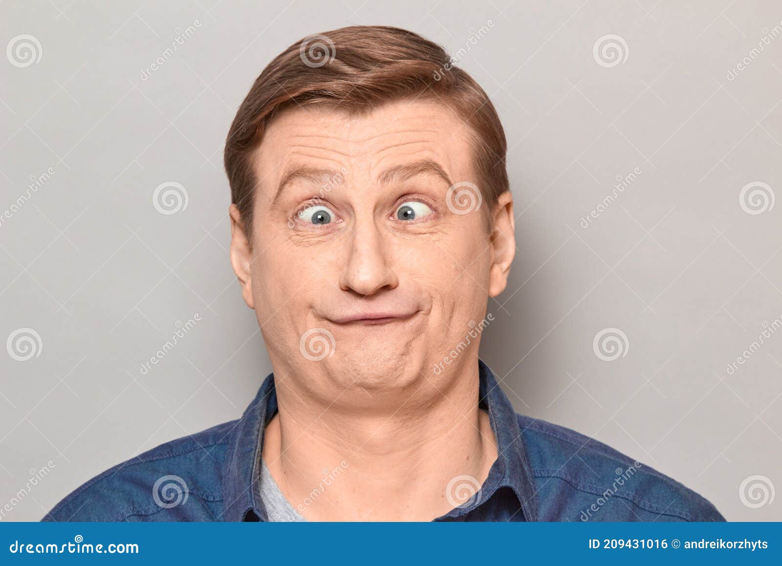 Portrait of Funny Confused Man with with Crossed Eyes Stock Photo - Image  of expression, casual: 209431016