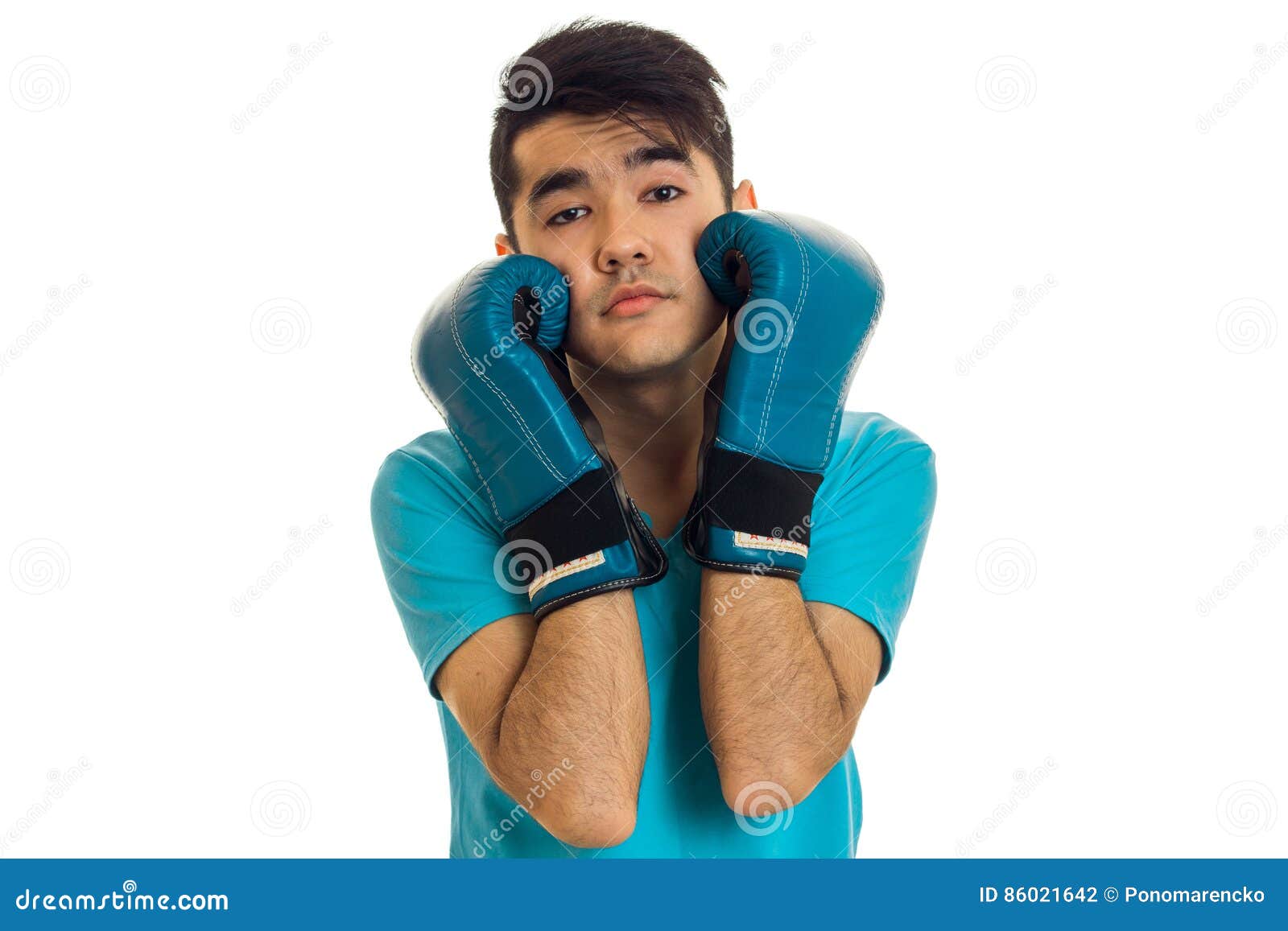 Portrait of Funny Guy Practicing Boxing in Blue Gloves Isolated on White Background Stock Photo