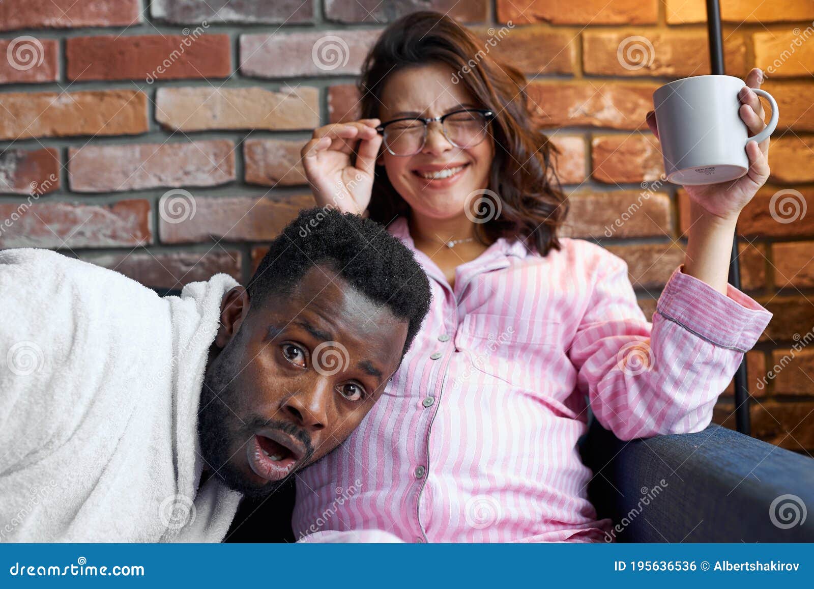 Portrait Of Funny  Positive Mixed  Race Couple  Expecting 