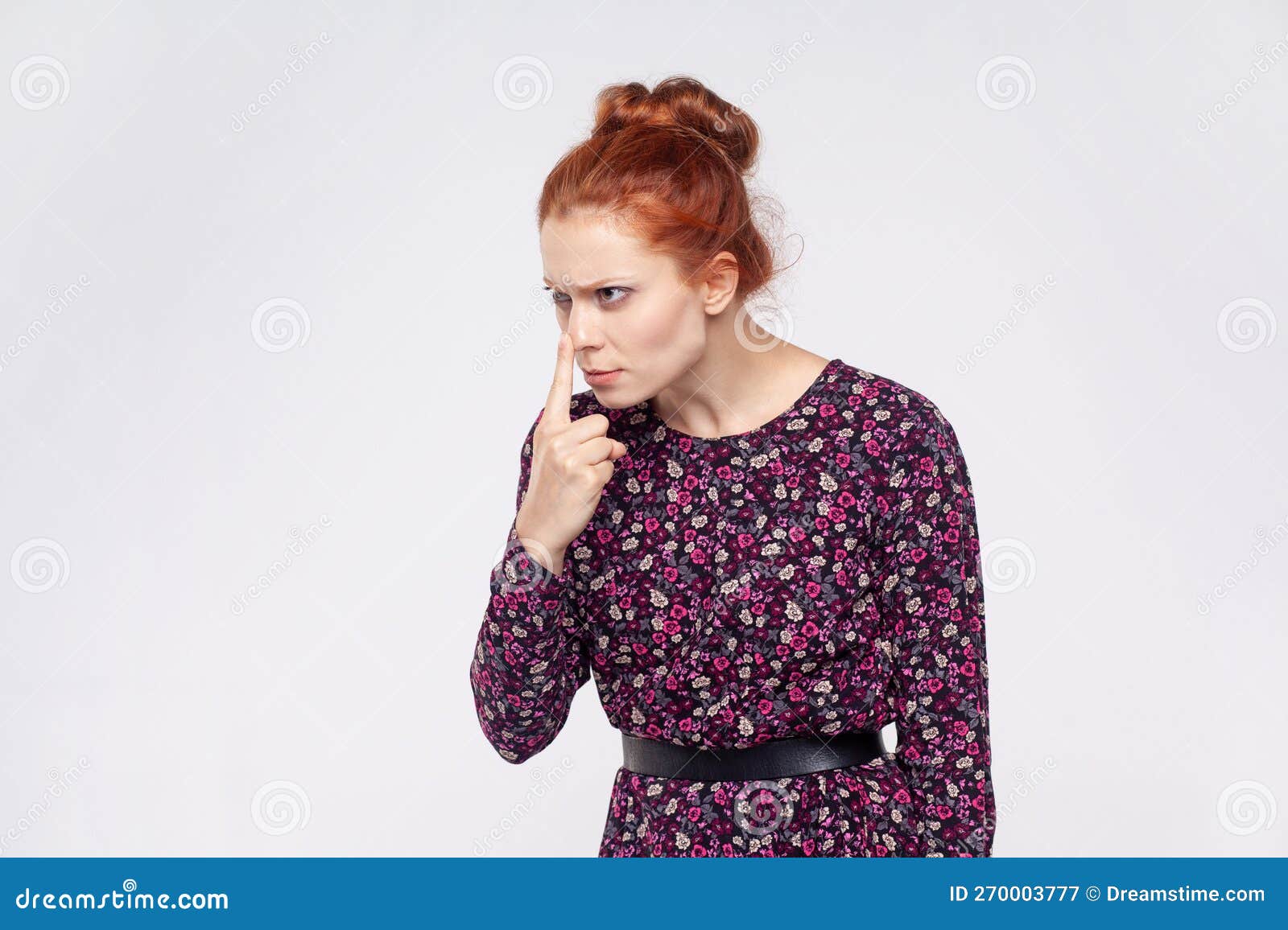 woman pointing nose doing lie gesture, suspecting trickster in falsehood, disbelief.