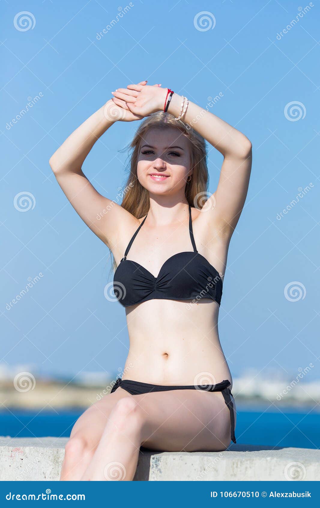 Portrait of Girl in Black Bikini with Shadow on Face Stock Photo