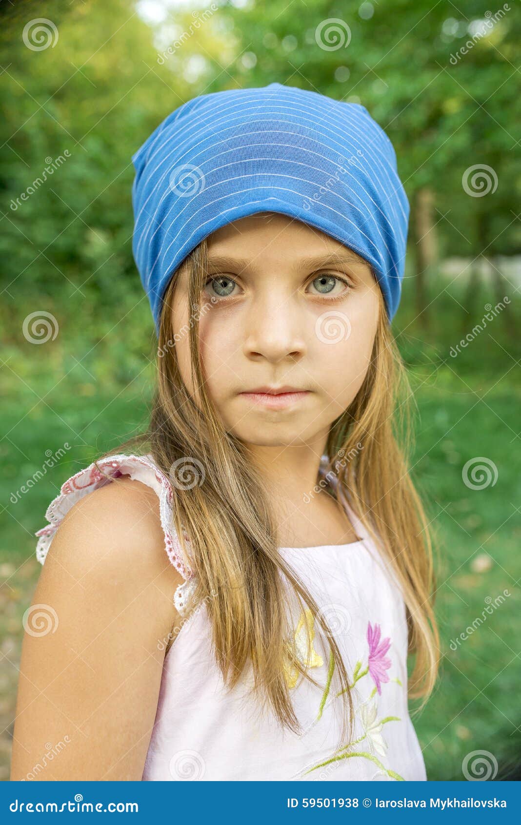 Portrait of a Girl in a Blue Hat Stock Photo Image of close, hair