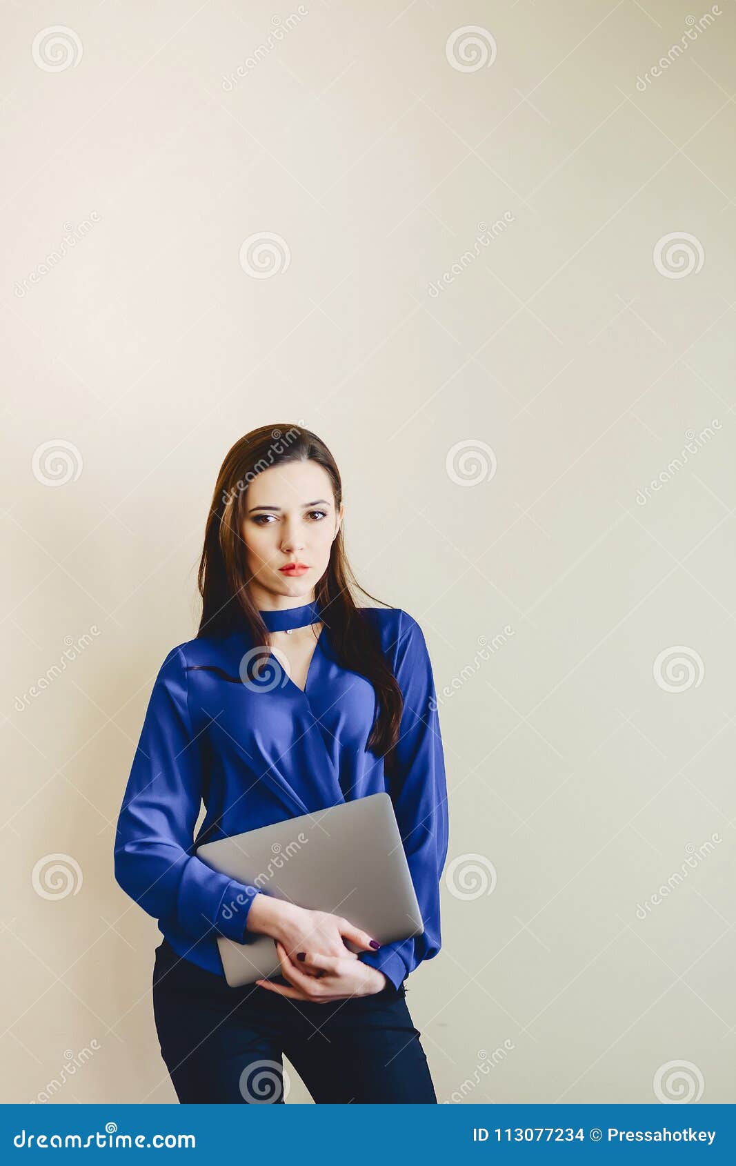 Portrait Girl With Laptop On Background Of Wall Stock Photo Image