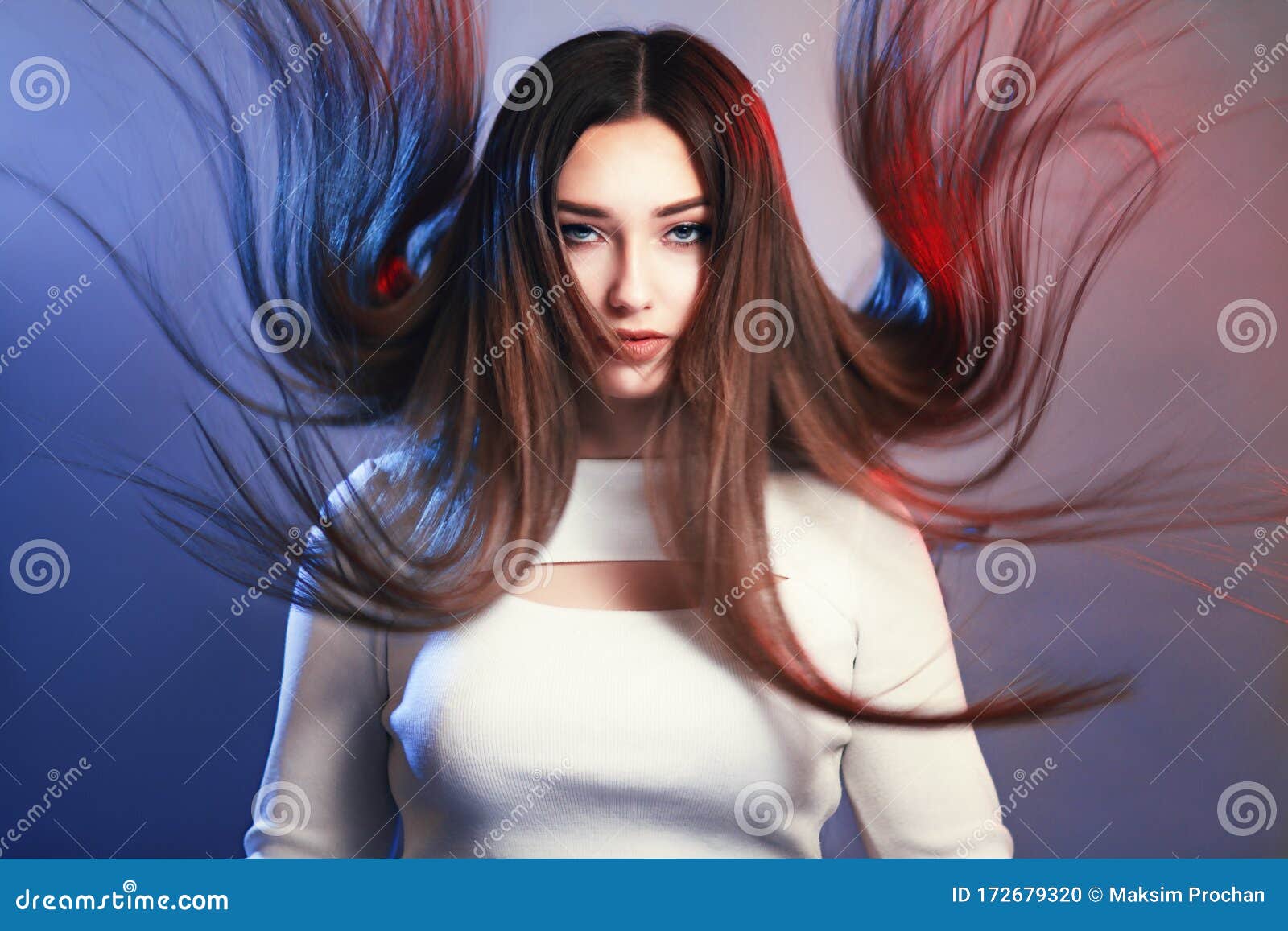 Portrait of Girl with Long Hair Flying in Air on Studio Background, Young  Woman Looking Straight Confidently , Fashion Model, Stock Photo - Image of  hair, insolence: 172679320