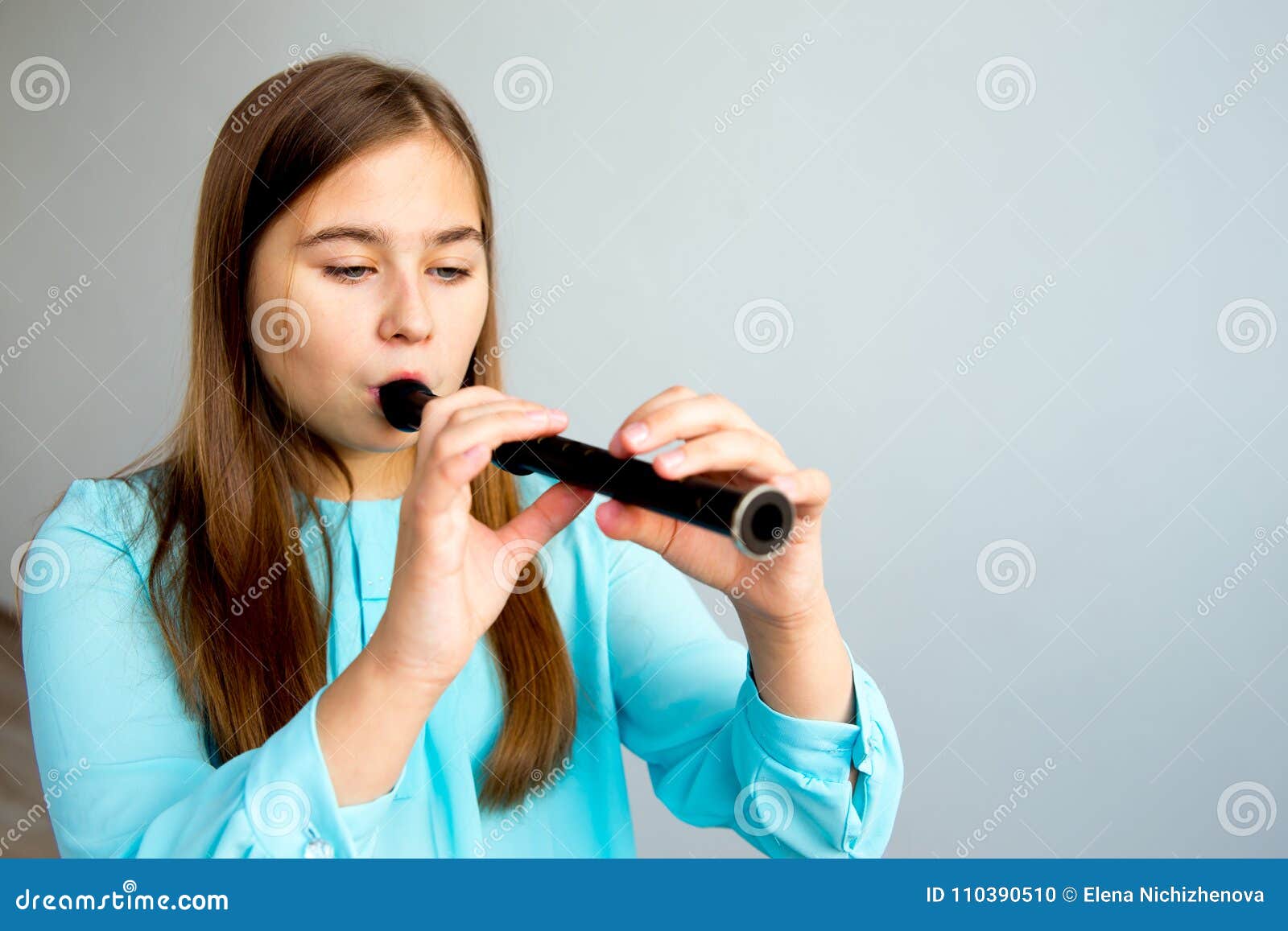 Girl playing flute stock photo. Image of play, beautiful 110390510