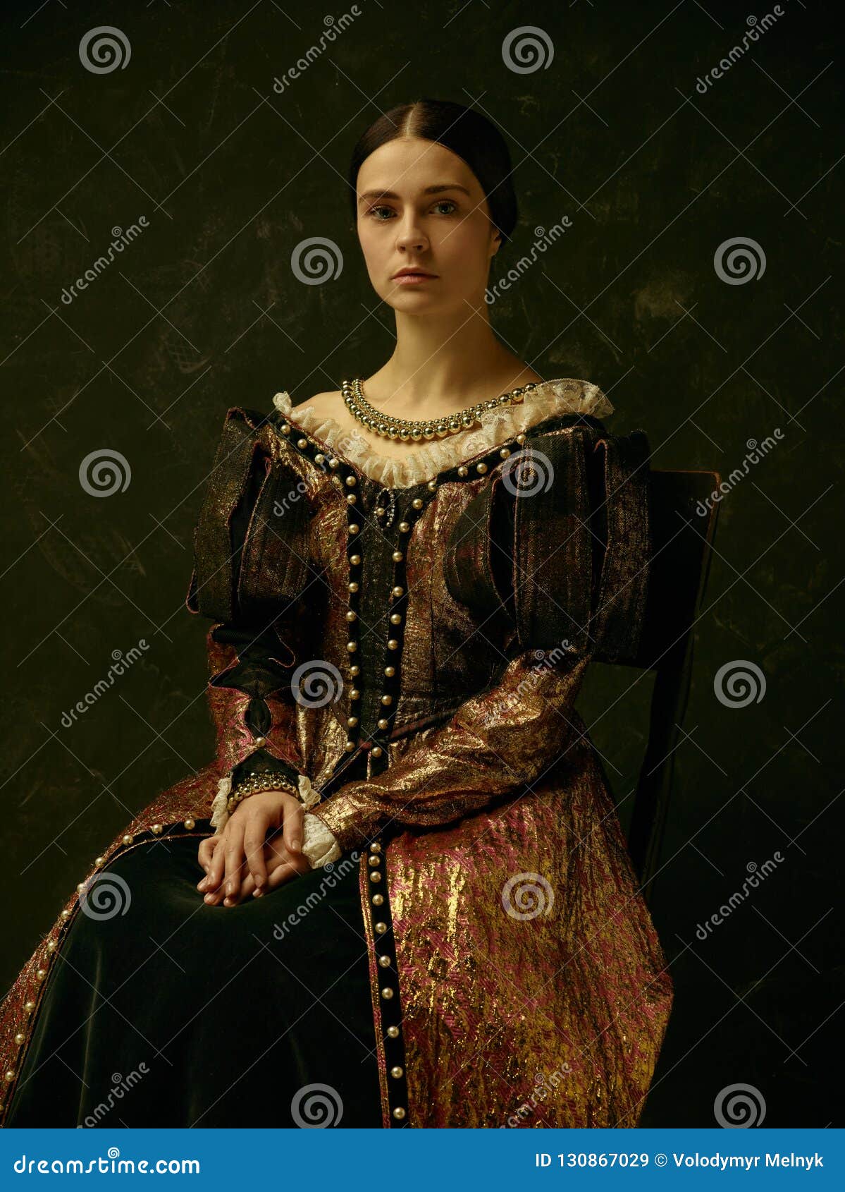 portrait of a girl wearing a retro princess or countess dress