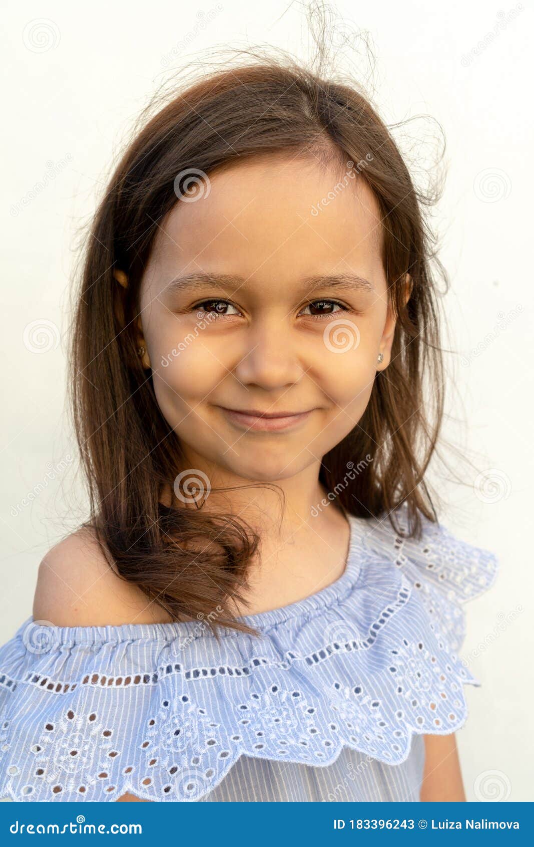 Portrait of a Girl of 7 Years Old with Brown Hair and Brown Eyes in a Gentle Blue Romantic Blouse on a White Background Stock Image - Image of brown, schoolgirl: 183396243 Portrait of a Girl of 7 Years Old with Brown Hair and Brown Eyes in a Gentle Blue Romantic Blouse on a White Background Stock Image - Image of brown, schoolgirl: 183396243
