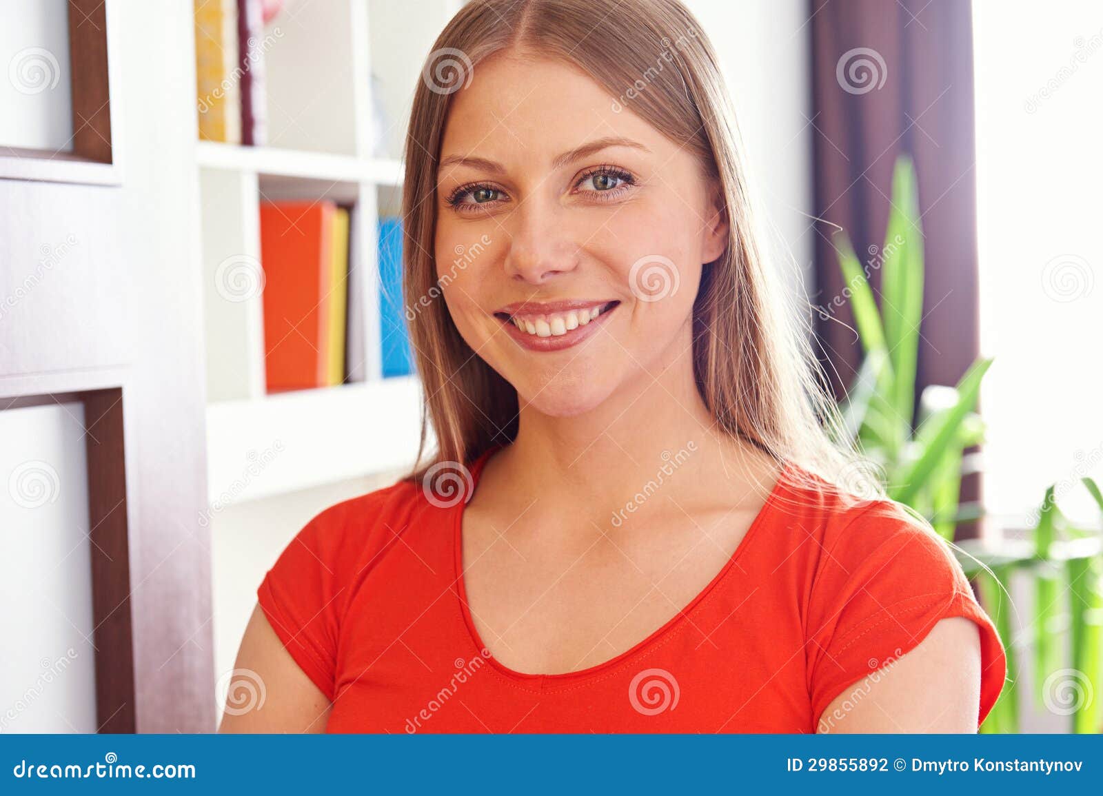 glad young woman at home