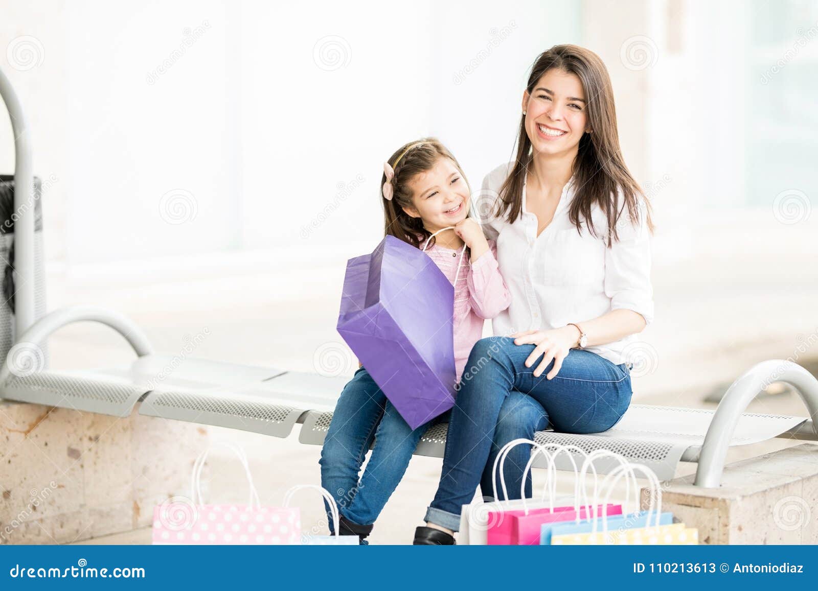 Happy Mother And Daughter Relaxing After Shopping Spree Stock Image Image Of Looking Cute