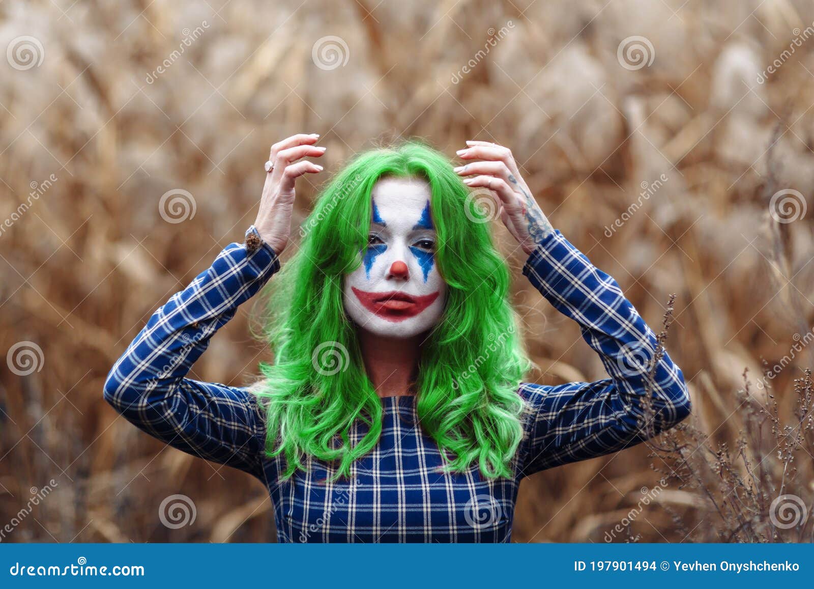 Portrait of a Greenhaired Girl with Joker Makeup on a Orange ...