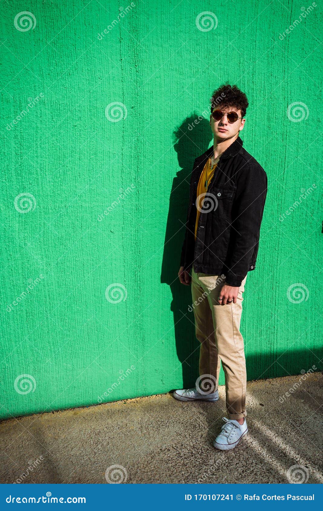 Portrait of a Guy Dressed Modern in the Street with Sunglasses ...