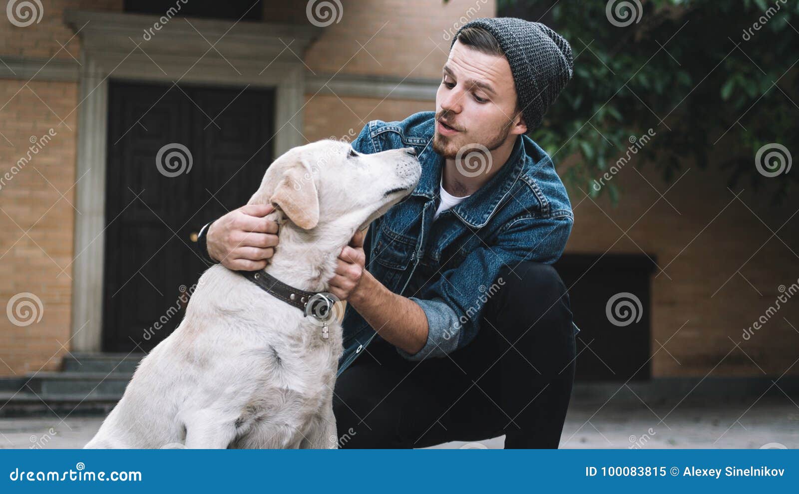 a guy with a dog
