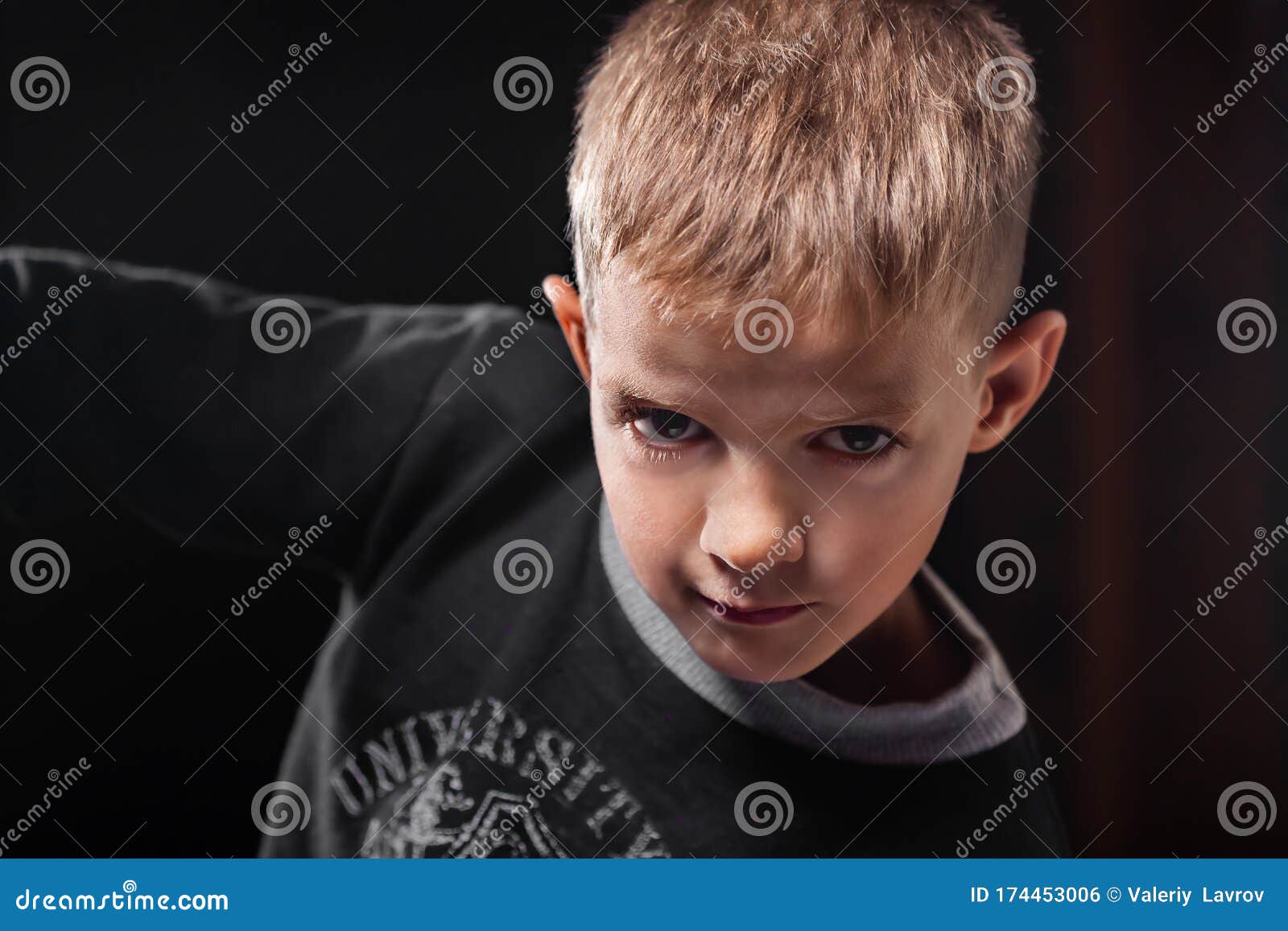 Portrait of a Handsome Boy on a Black Background Stock Photo Image of