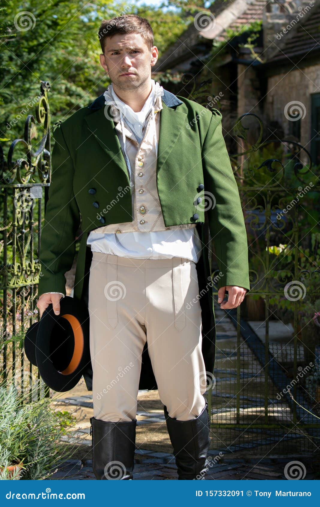 Portrait of Handsome Gentleman Dressed in Vintage Costume, Holding Top ...