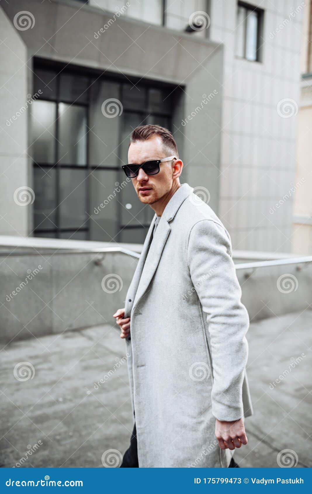 Portrait of a Handsome Man in Coat and Sunglasses Stock Image - Image ...