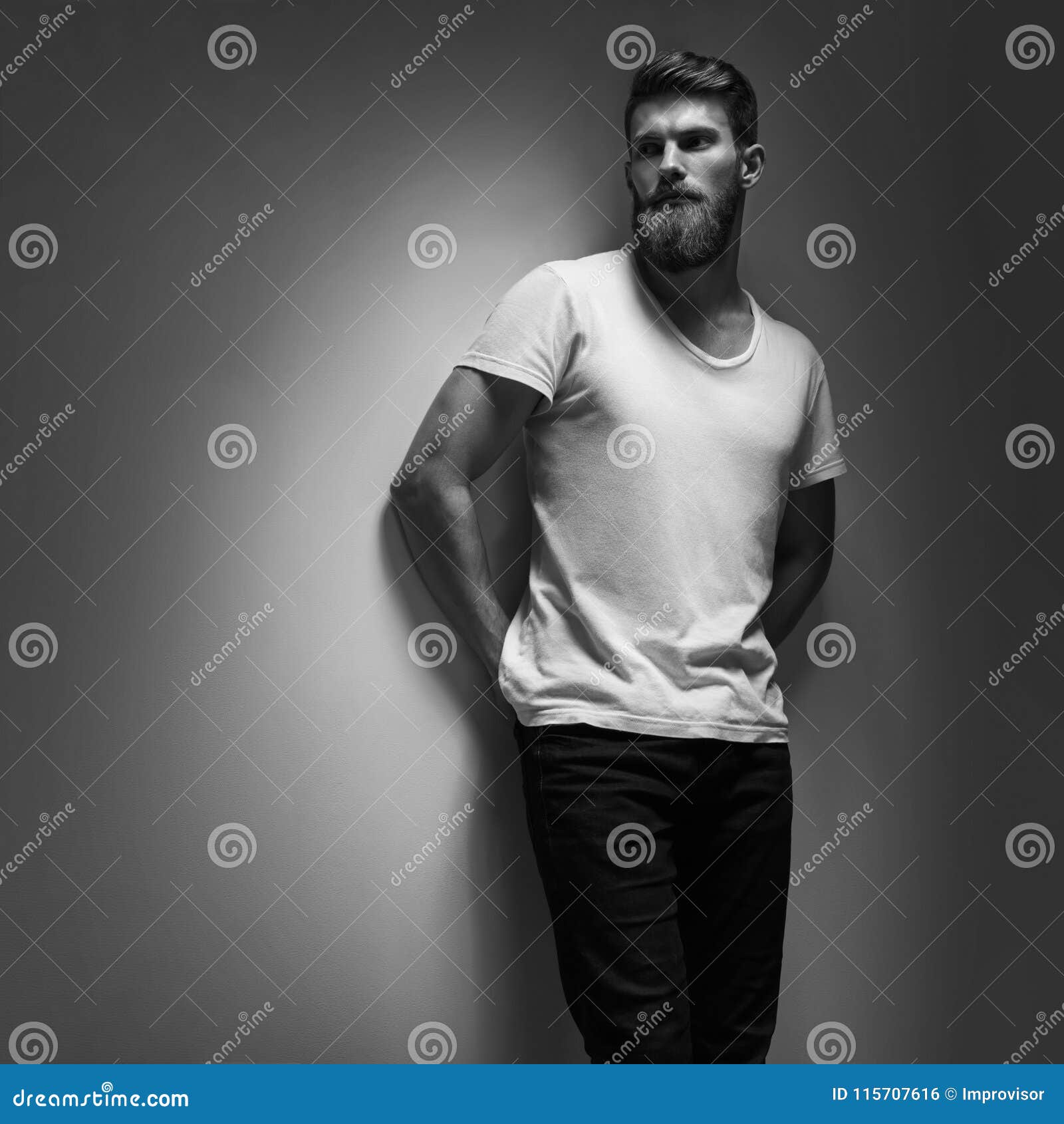 Portrait of a Handsome Man in a White T-shirt from the Gray Stock Photo ...