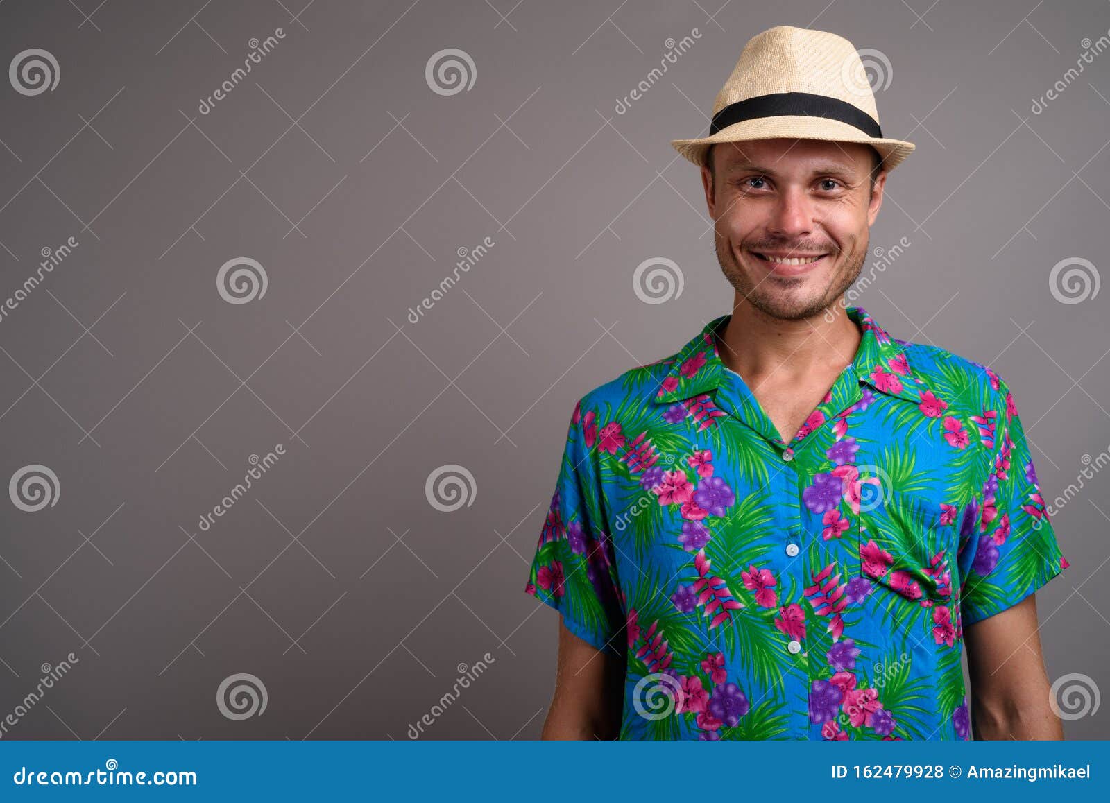 Portrait of Handsome Tourist Man Wearing Hat Ready for Vacation Against ...