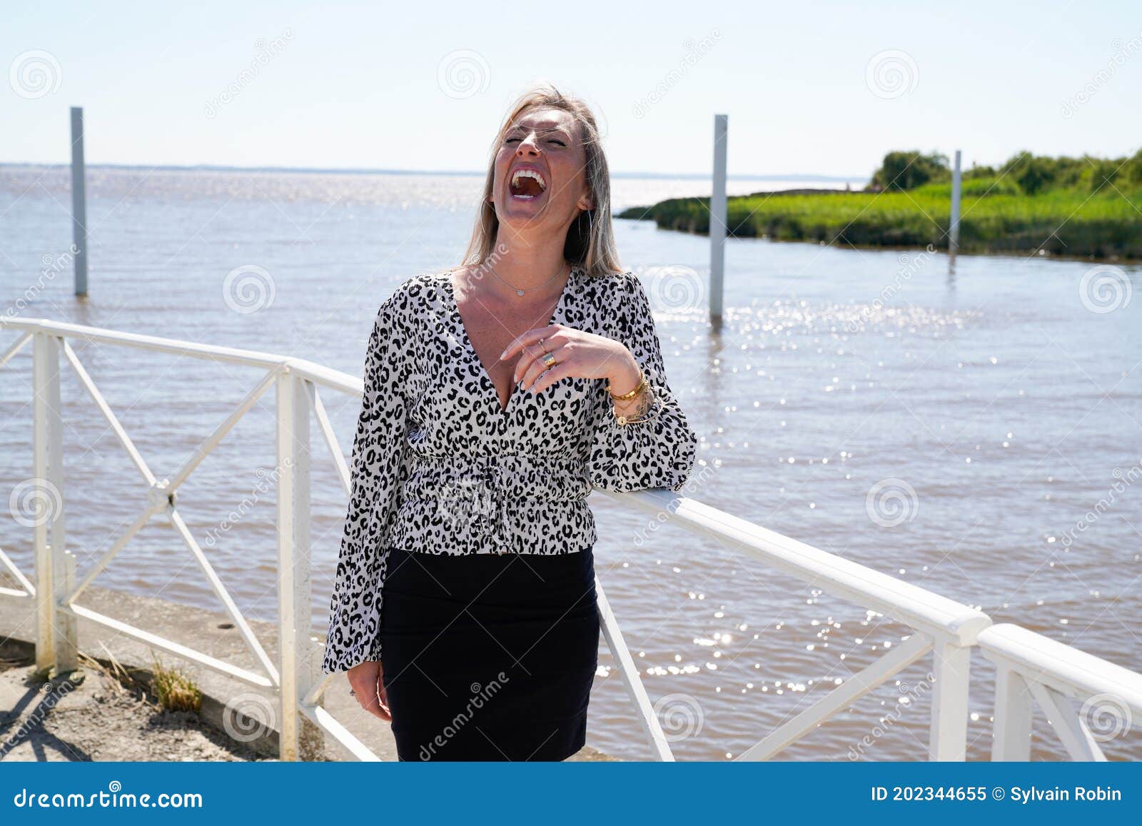 Portrait Of Happy Beautiful Blonde Woman Enjoy Smiling Laughing On Summer Vacation Stock Image