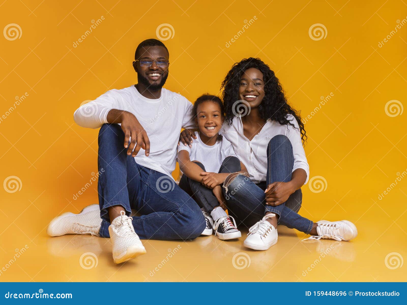 Portrait of Happy Black Family Smiling Over Yellow Studio Background Stock  Photo - Image of happy, girl: 159448696