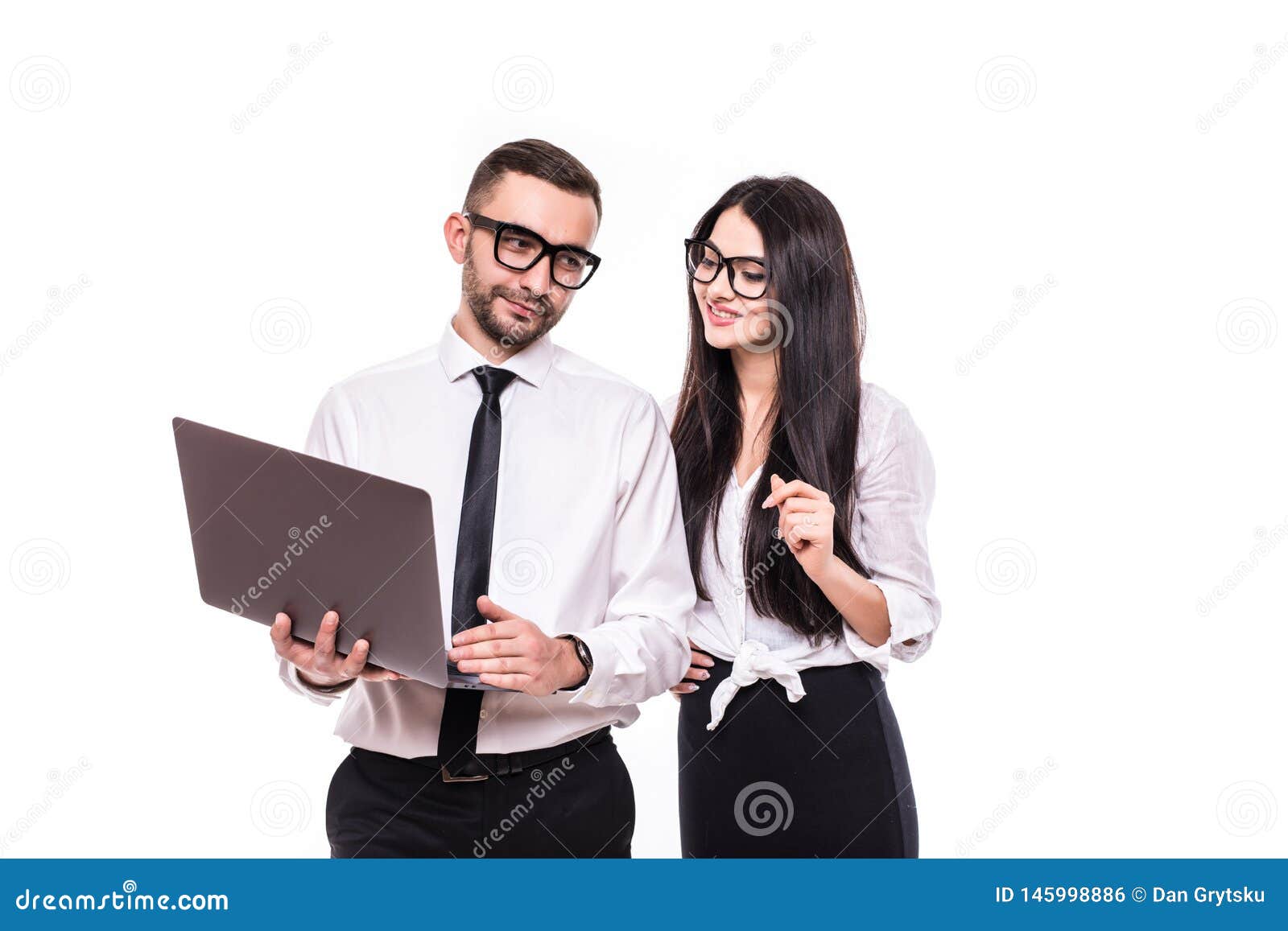 Portrait of a Happy Business Couple Looking at Laptop Computer Isolated ...