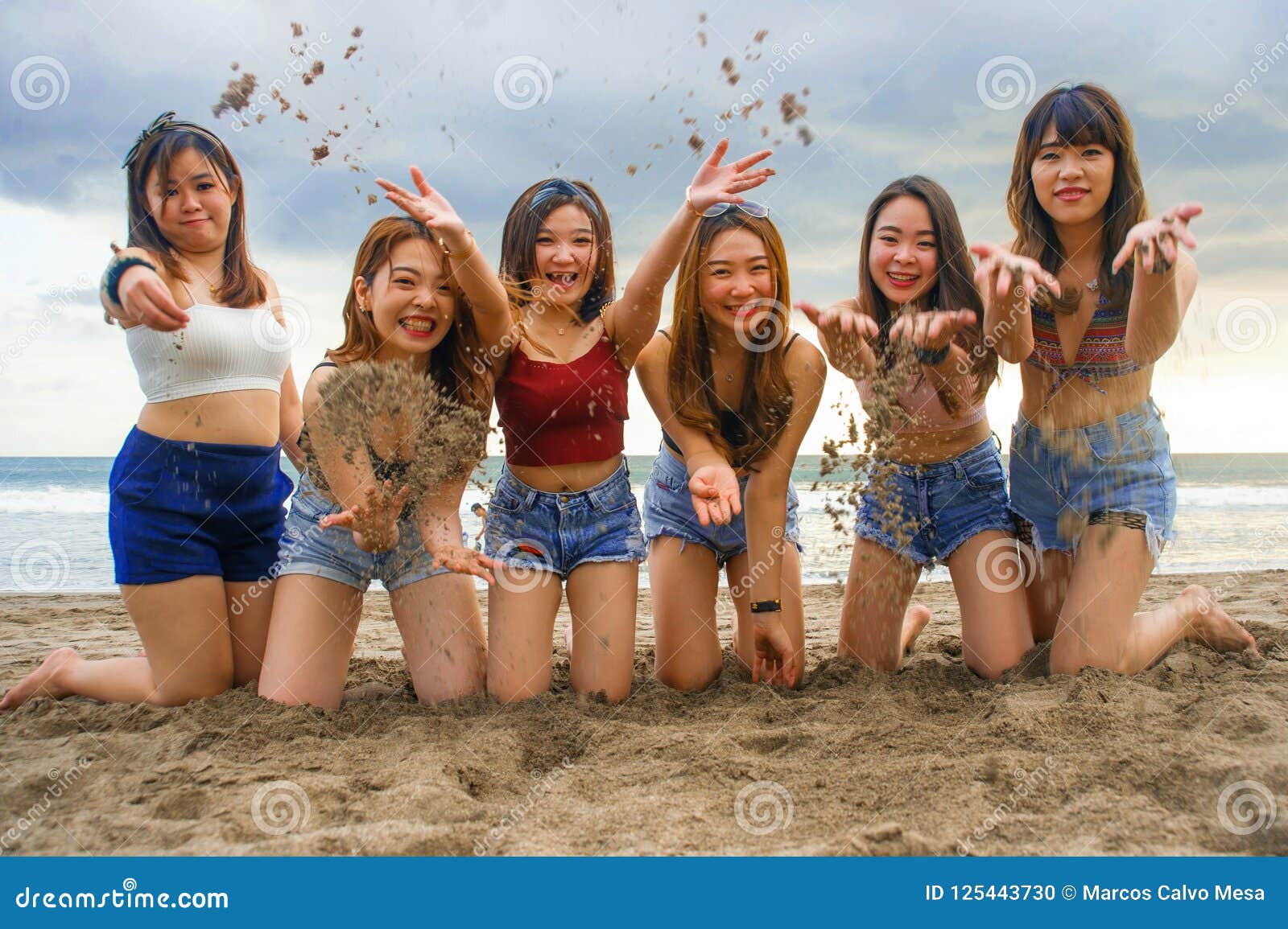 Portrait Of Happy And Cheerful Group Of Asian Korean And Chinese Young