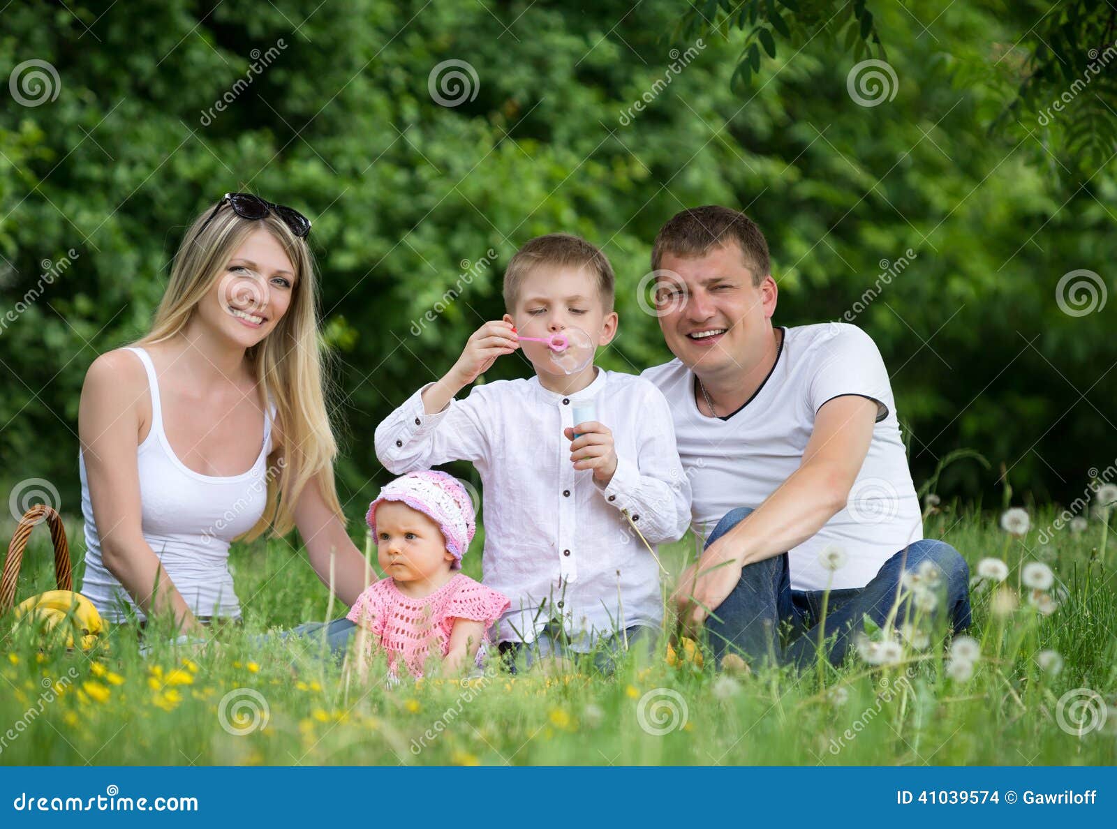 Portrait Of Happy Family In Garden Stock Photo - Image of horizontal