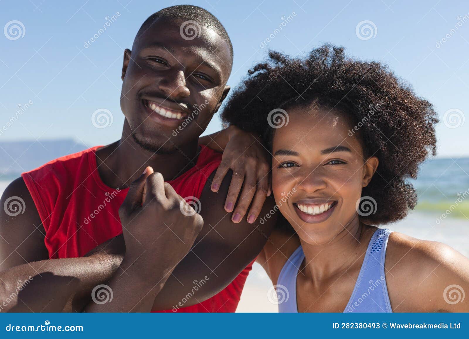 Portrait of Happy, Fit African American Couple Exercising, Stretching ...