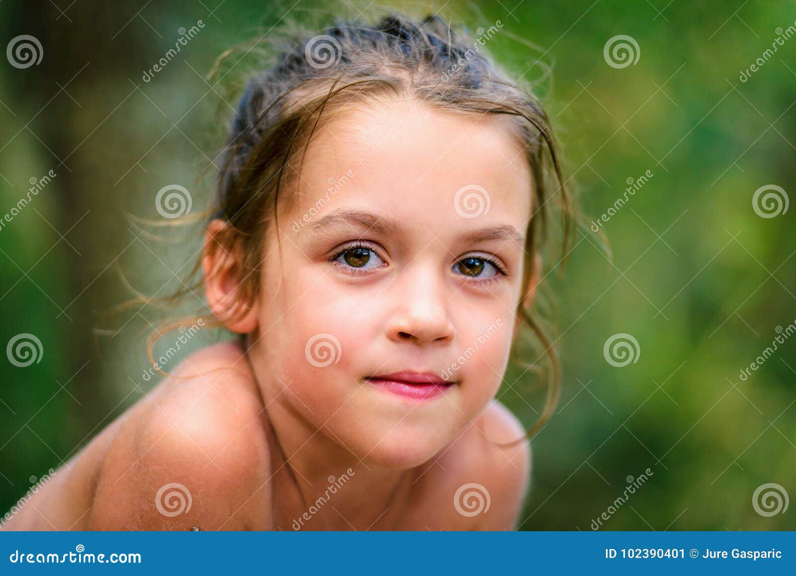 portrait of happy girl child is smiling enjoying adopted life.