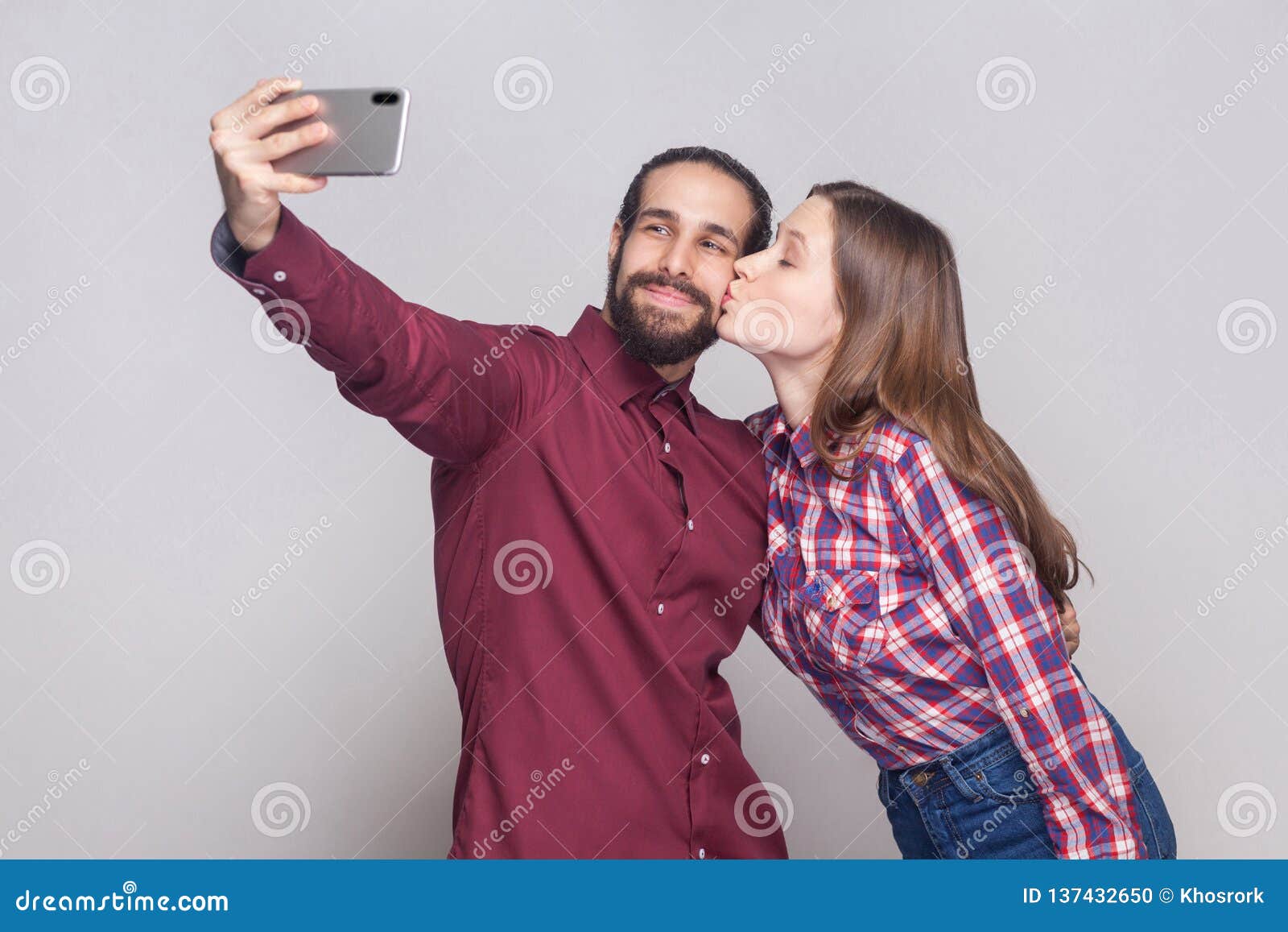 Premium Photo | Stylish hipster couple taking selfie and kissing at  waterfall in forest in mountains handsome man and happy woman in hat  embracing on honeymoon travel together summer vacation