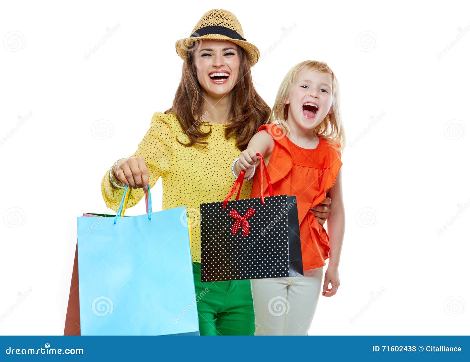 Portrait of Happy Mother and Daughter Showing Shopping Bags Stock Photo ...