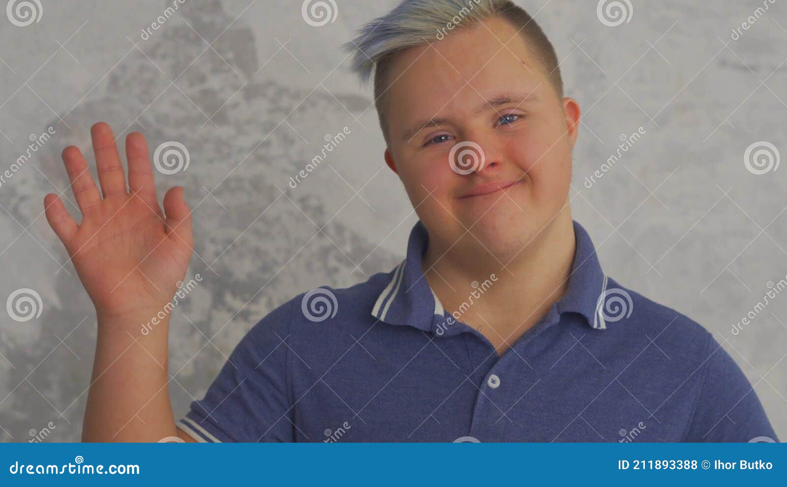 Portrait of Teenager Boy with Down Syndrome Say Hello Greeting. Stock ...