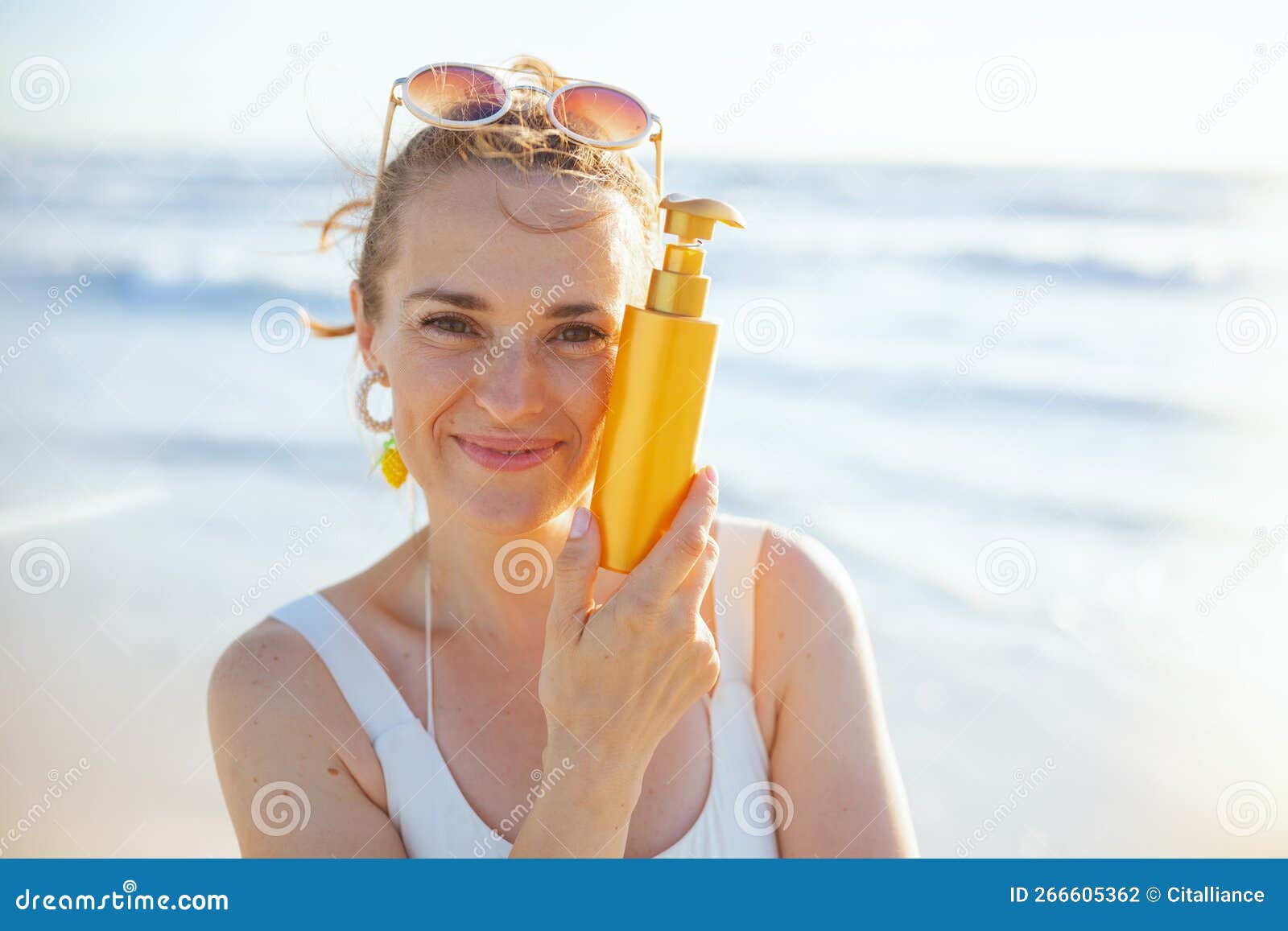 Happy Stylish Female in Swimwear at Beach Applying Sunscreen Stock ...