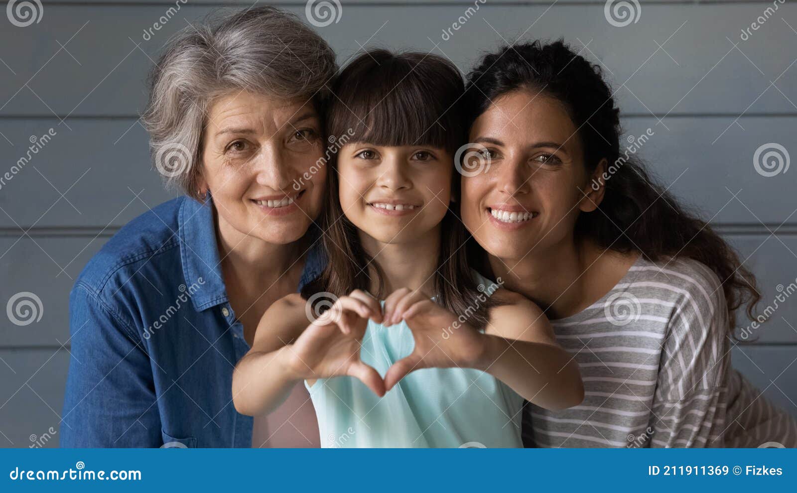 portrait of happy three generations of latino women