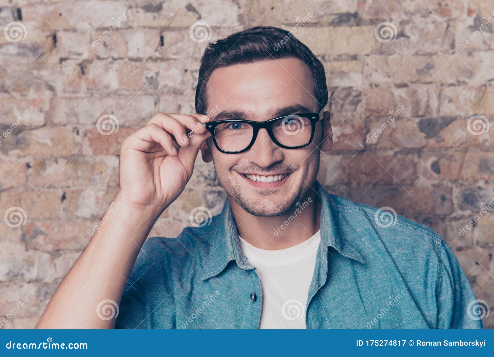 Portrait of Happy Toothy Smart Man Touching His Glasses Stock Image ...