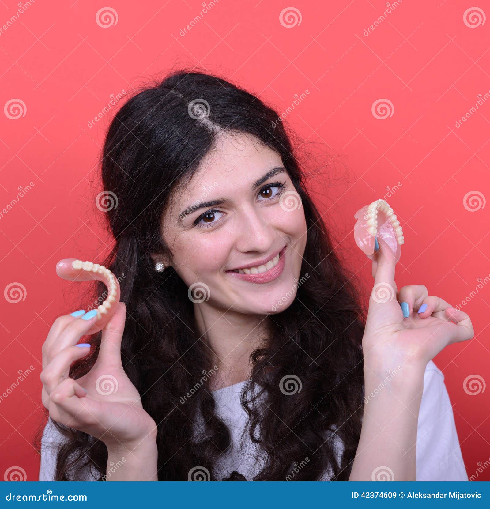 portrait-happy-woman-healthy-smile-holding-denture-again-image-made-studio-model-standing-against-colored-42374609.jpg