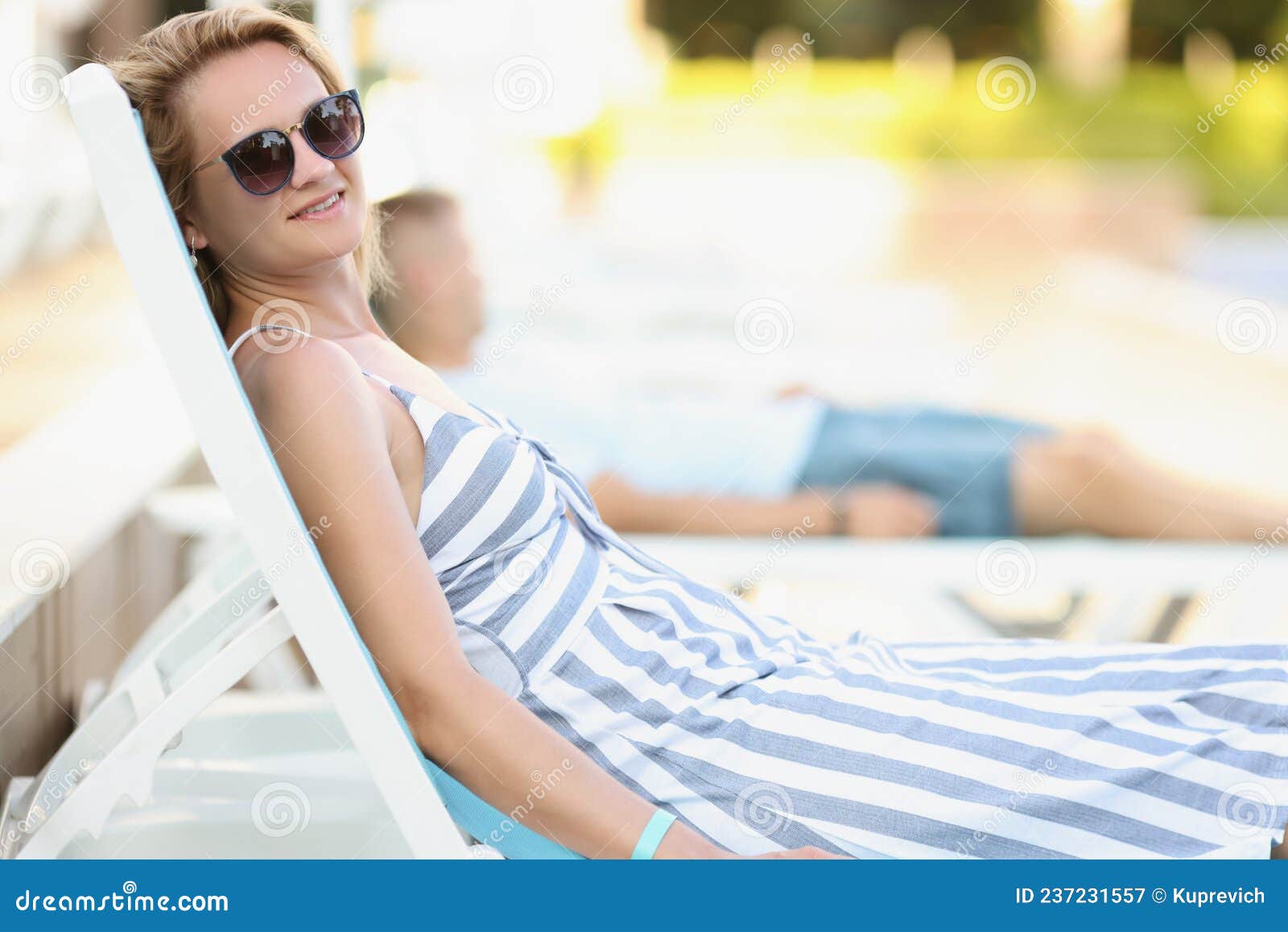 Happy Young Blonde Woman Lay on Sunbed in Pretty Summer Outfit Stock ...