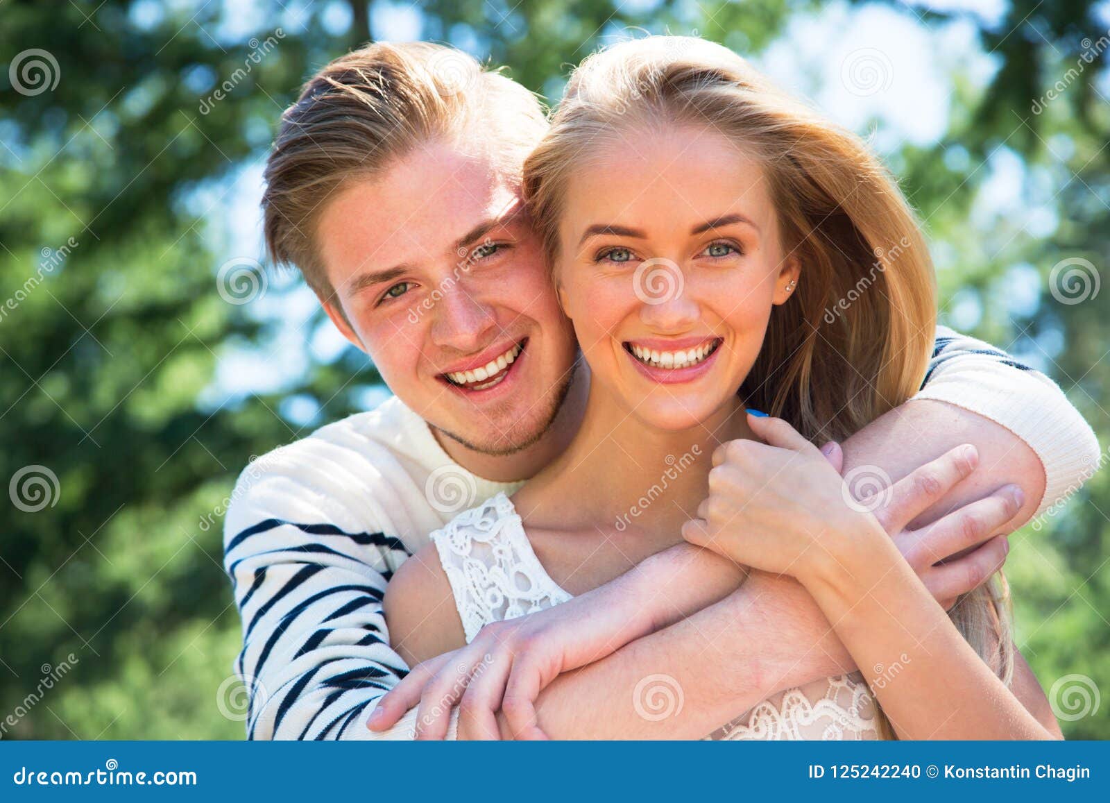 Portrait of a Happy Couple Laughing at Camera Stock Photo - Image of ...