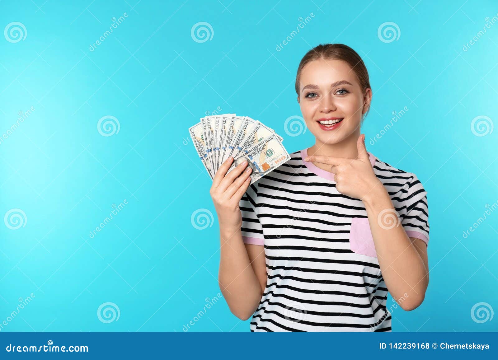 Portrait of Happy Young Woman with Money on Color Background Stock ...