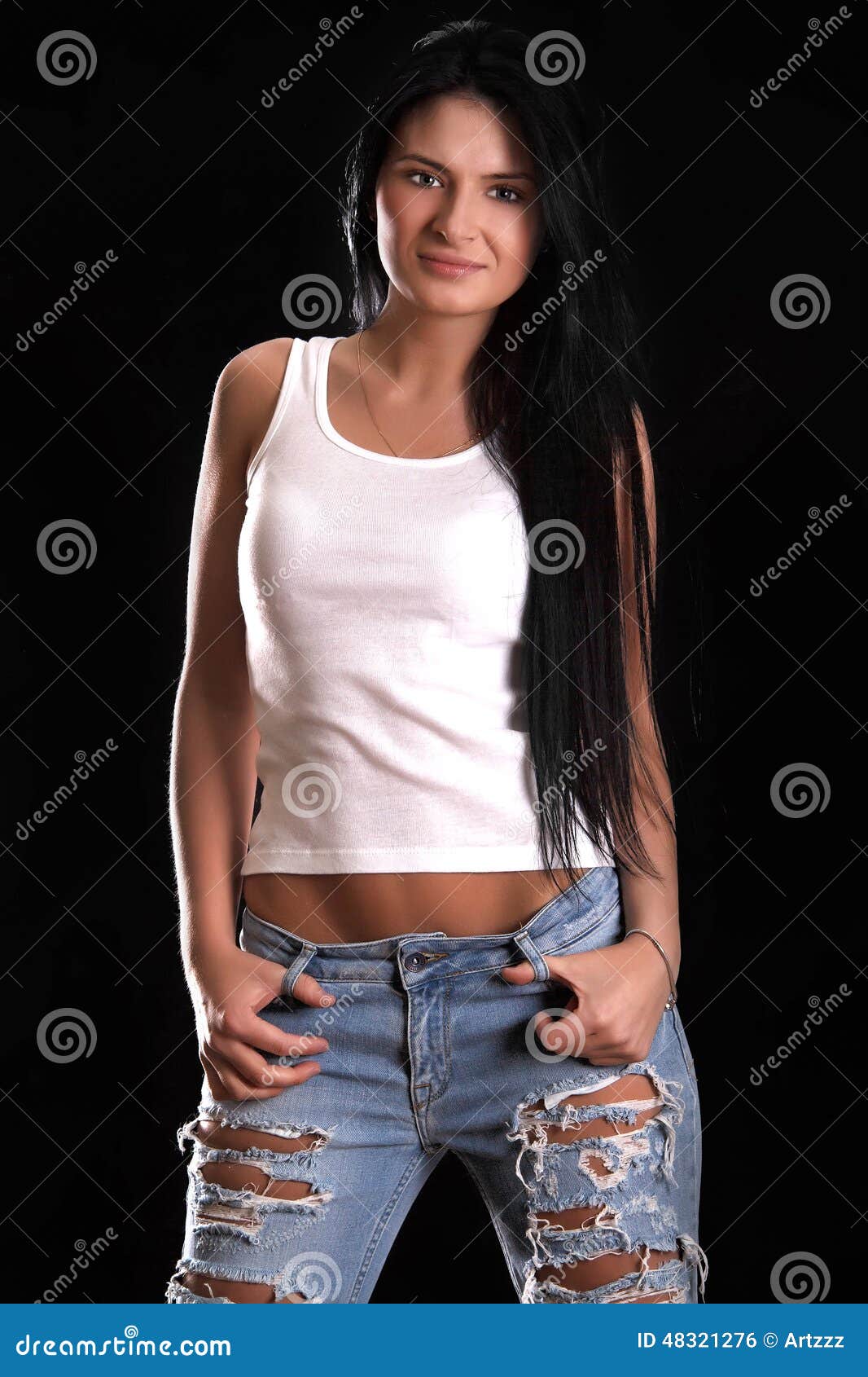 Portrait Of A Happy Young Woman In A Ragged Jeans And White Slee Stock ...