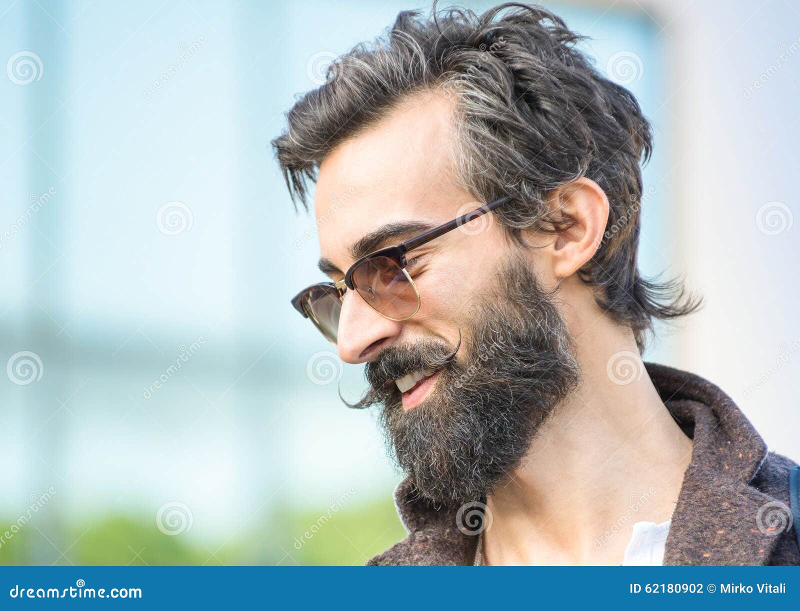 Portrait Of Hipster Guy With Confident Face Expression 
