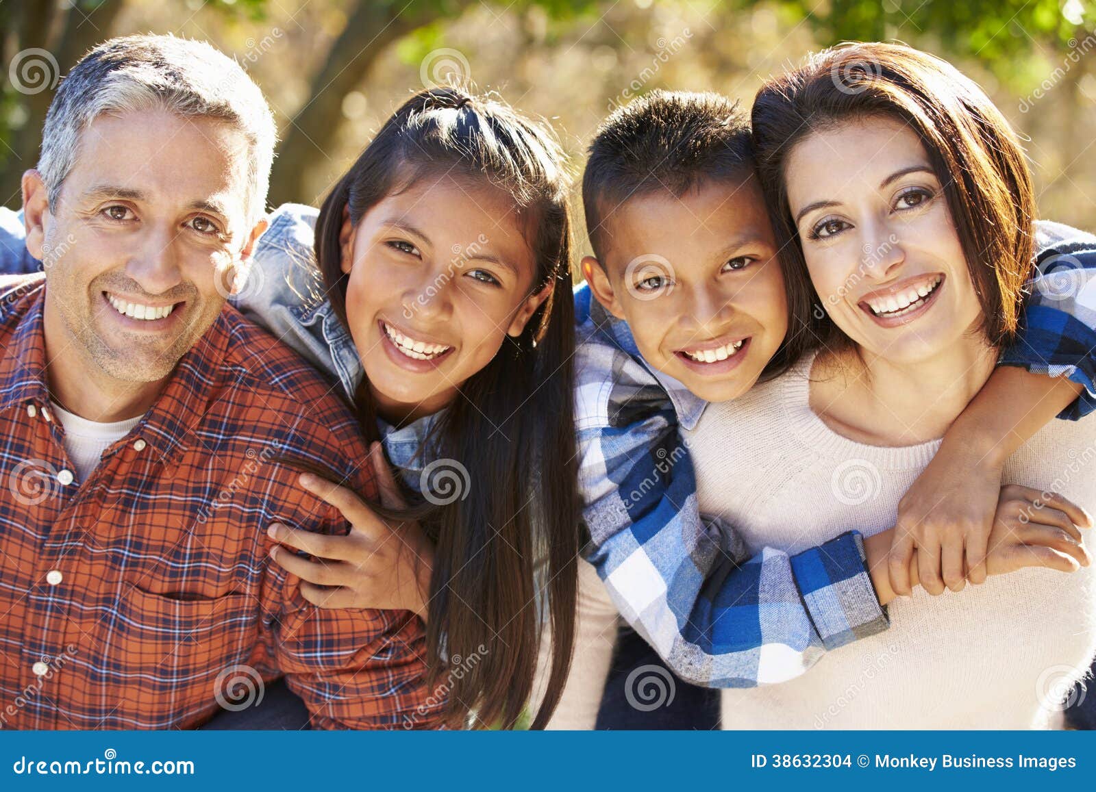portrait of hispanic family in countryside
