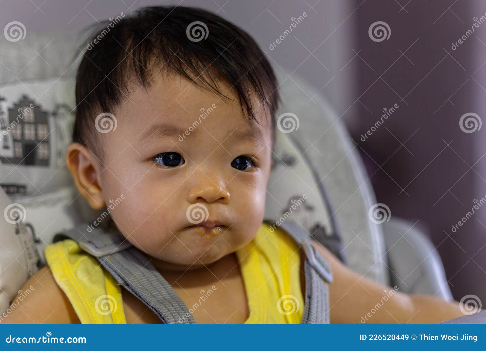 Adorable and Cute Happy Asian Chinese Baby Boy Siting on Baby Chair ...