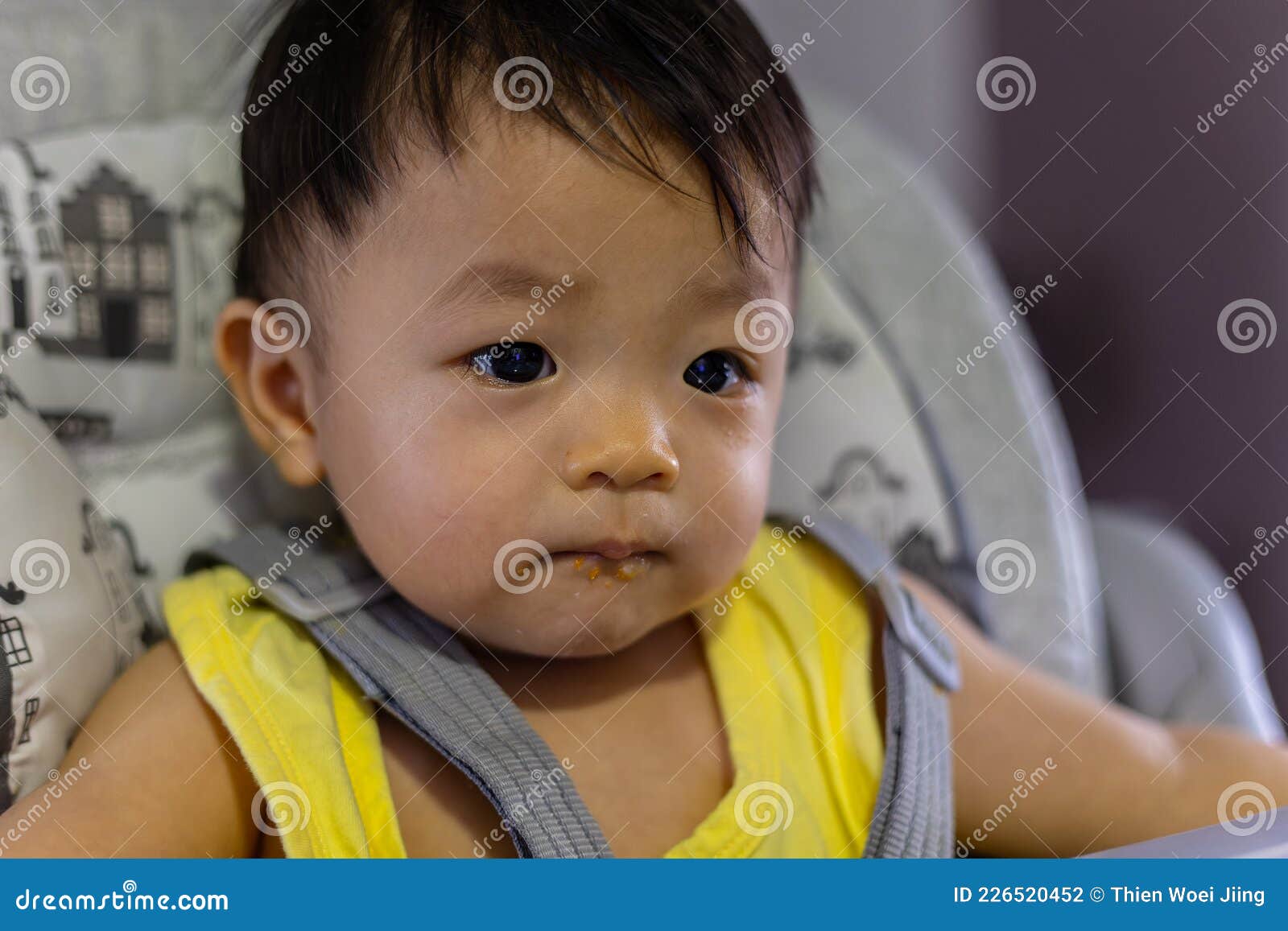 Adorable and Cute Happy Asian Chinese Baby Boy Siting on Baby Chair ...