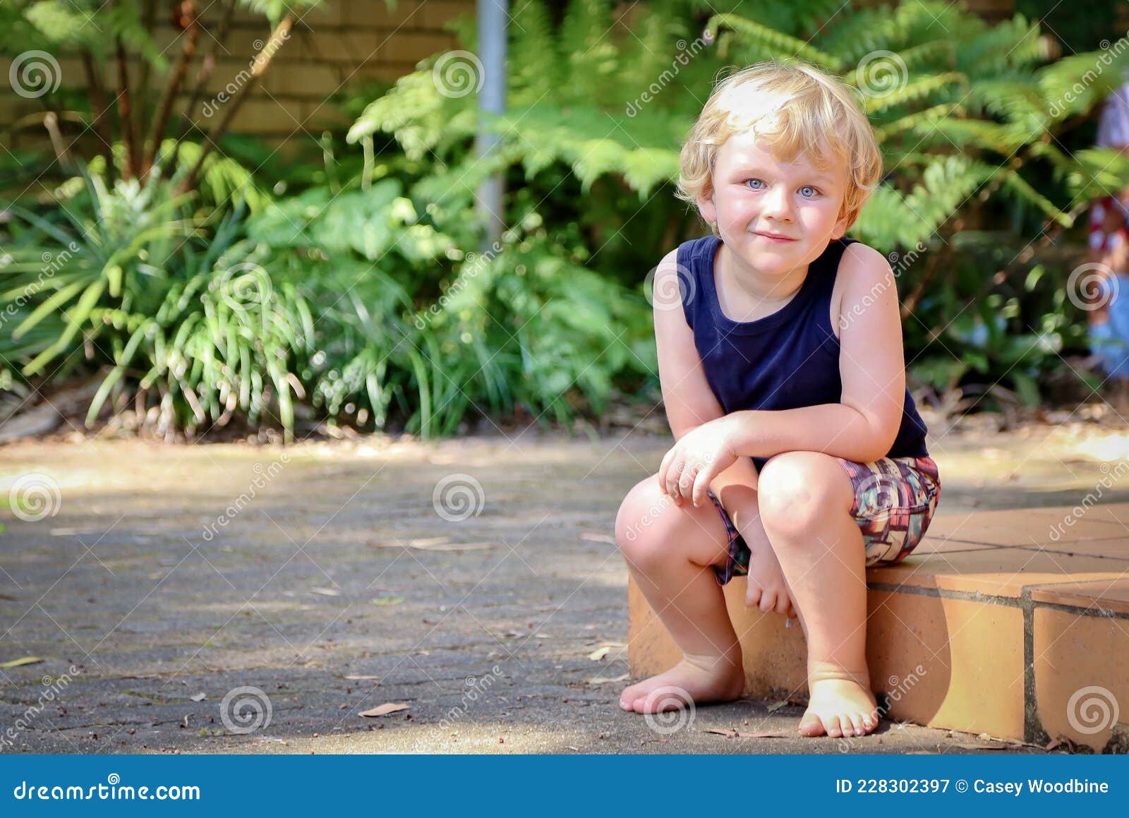 copper hair blue eyed alien kid