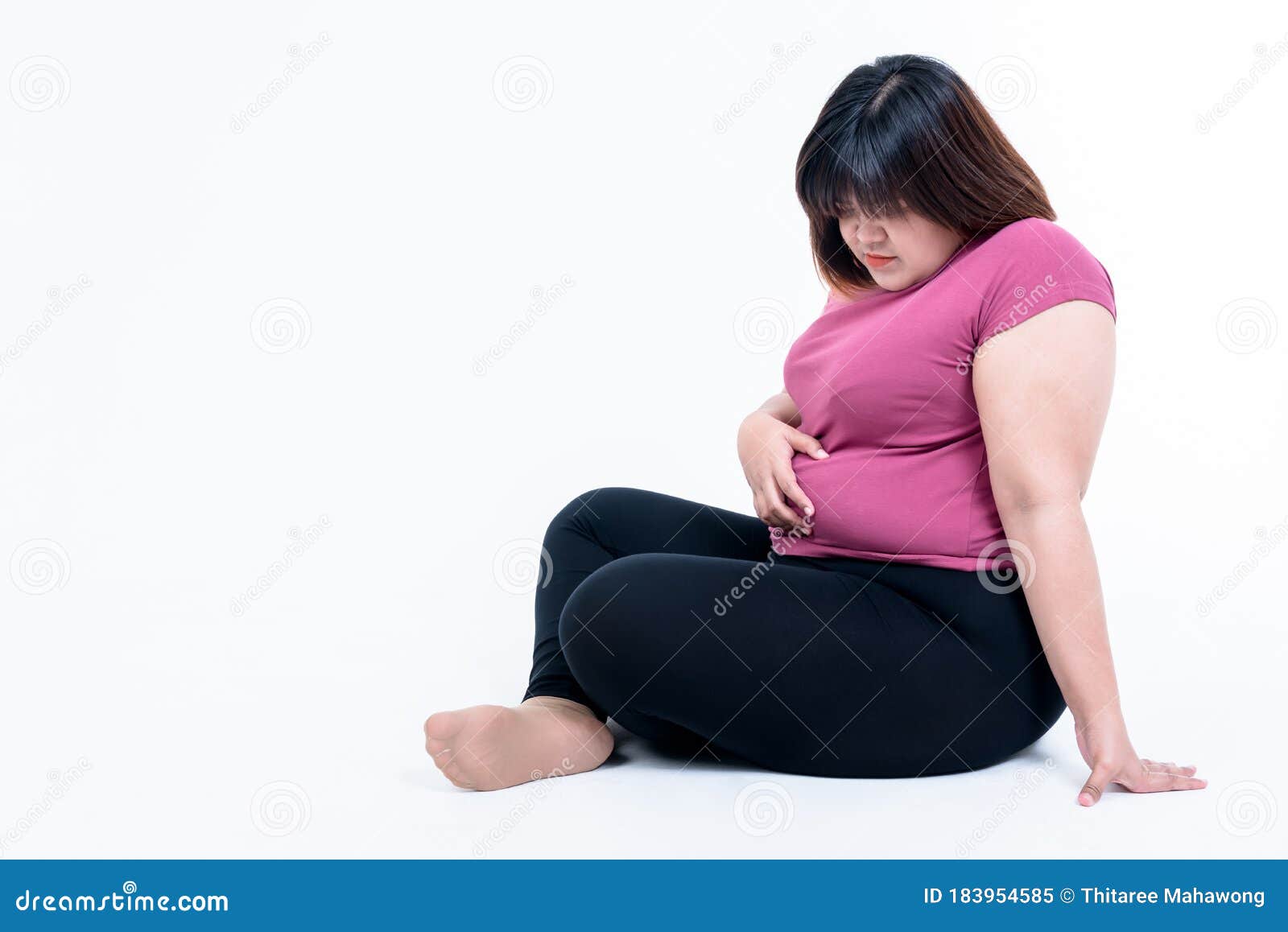 Portrait Images Of Fat Woman Sitting And Using Her Hands