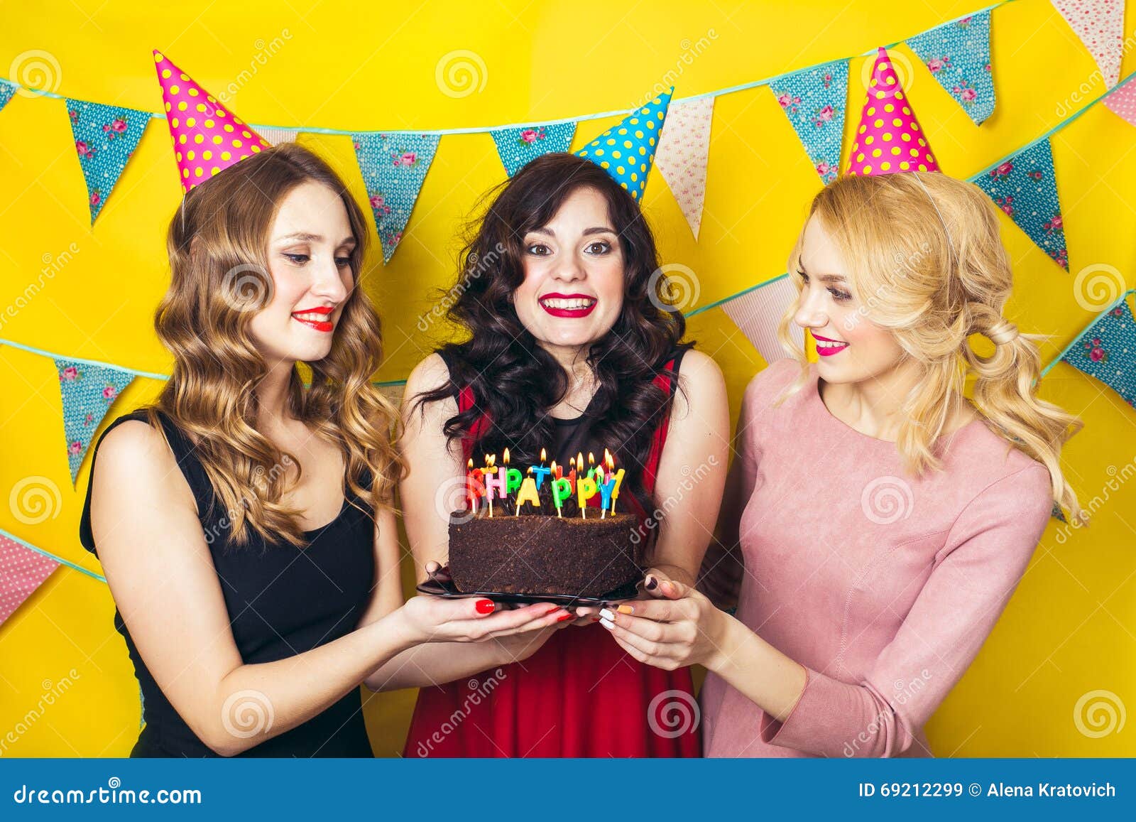 Portrait of Joyful Friends Toasting and Looking at Camera at ...