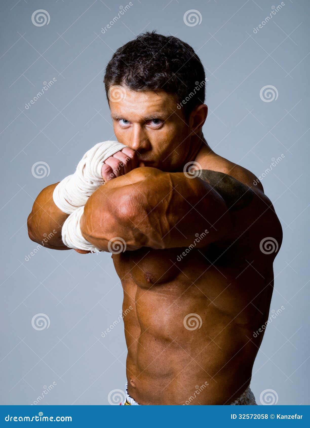 Portrait Of A Kick Boxer In Fighting Stance Royalty Free