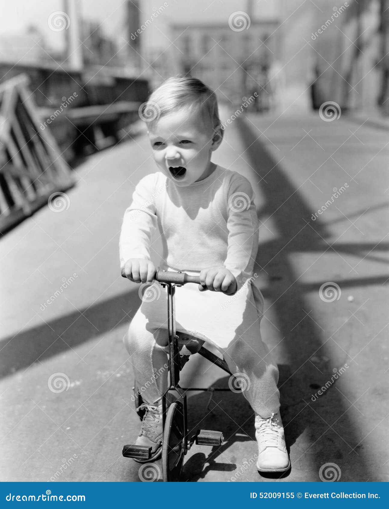 Portrait of Kid Riding Tricycle Stock Image Image of enthusiasm